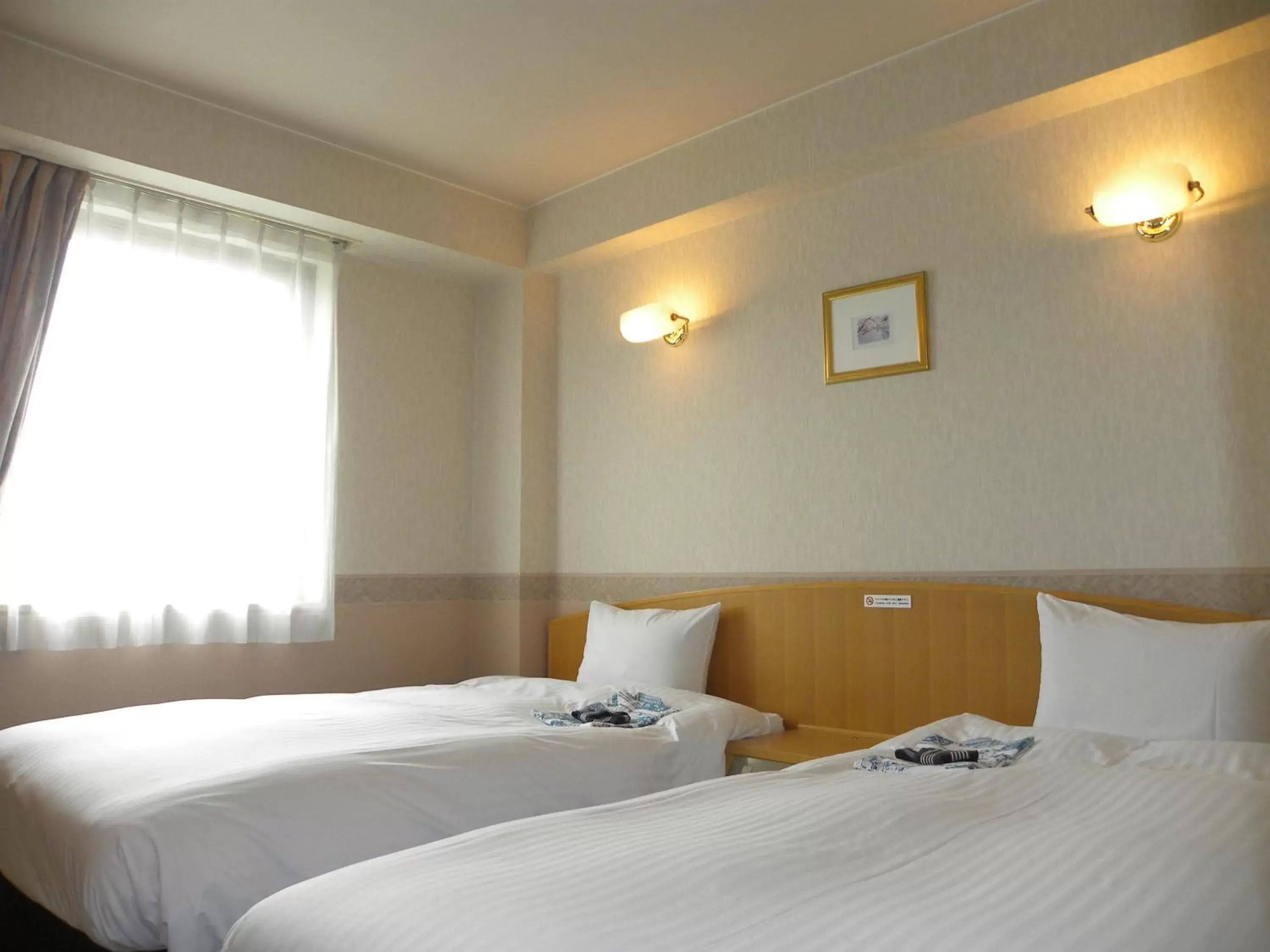 Photo of the whole room, Bed in Hotel Benex Yonezawa