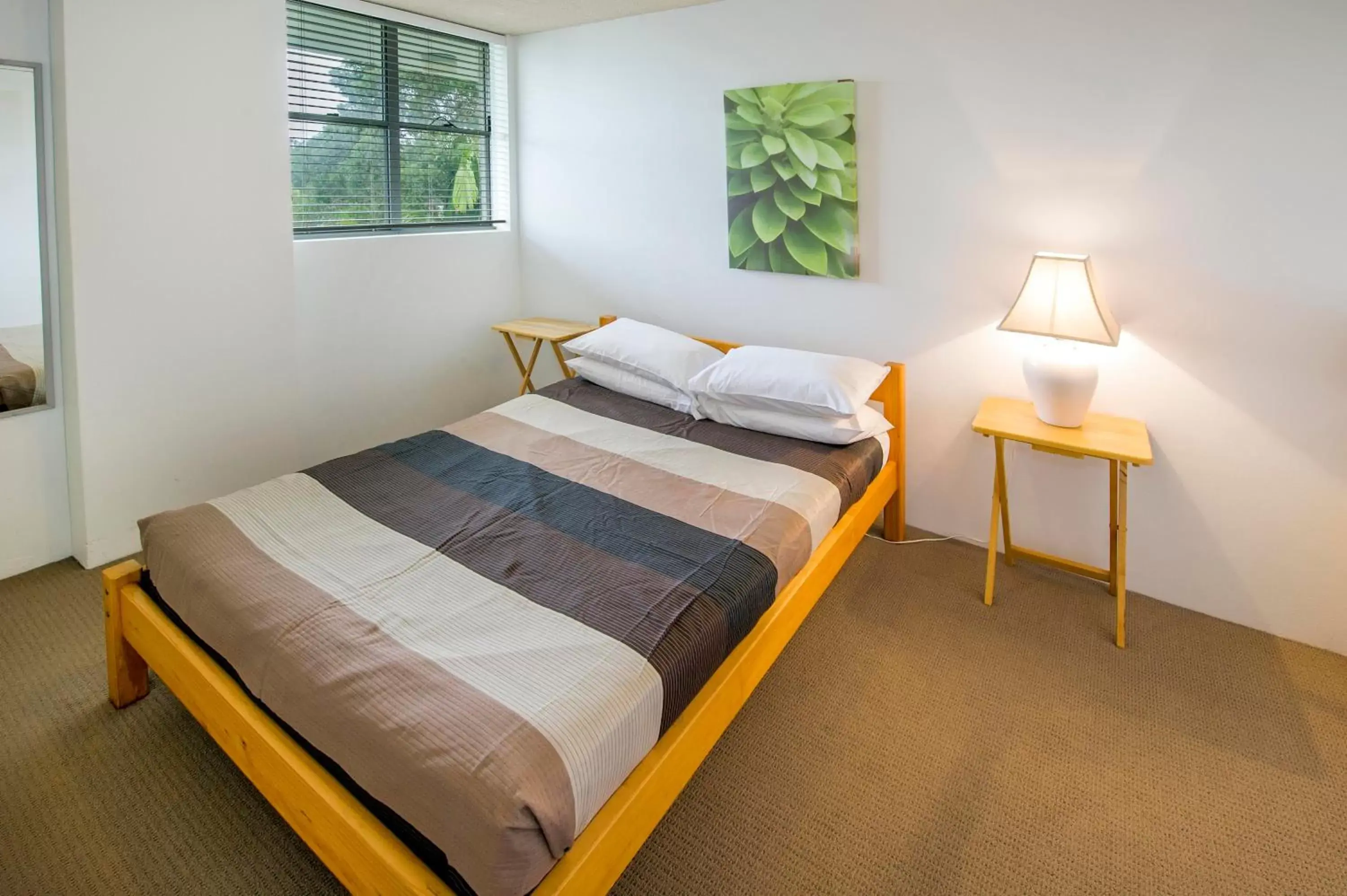 Bedroom, Bed in Tradewinds Apartments