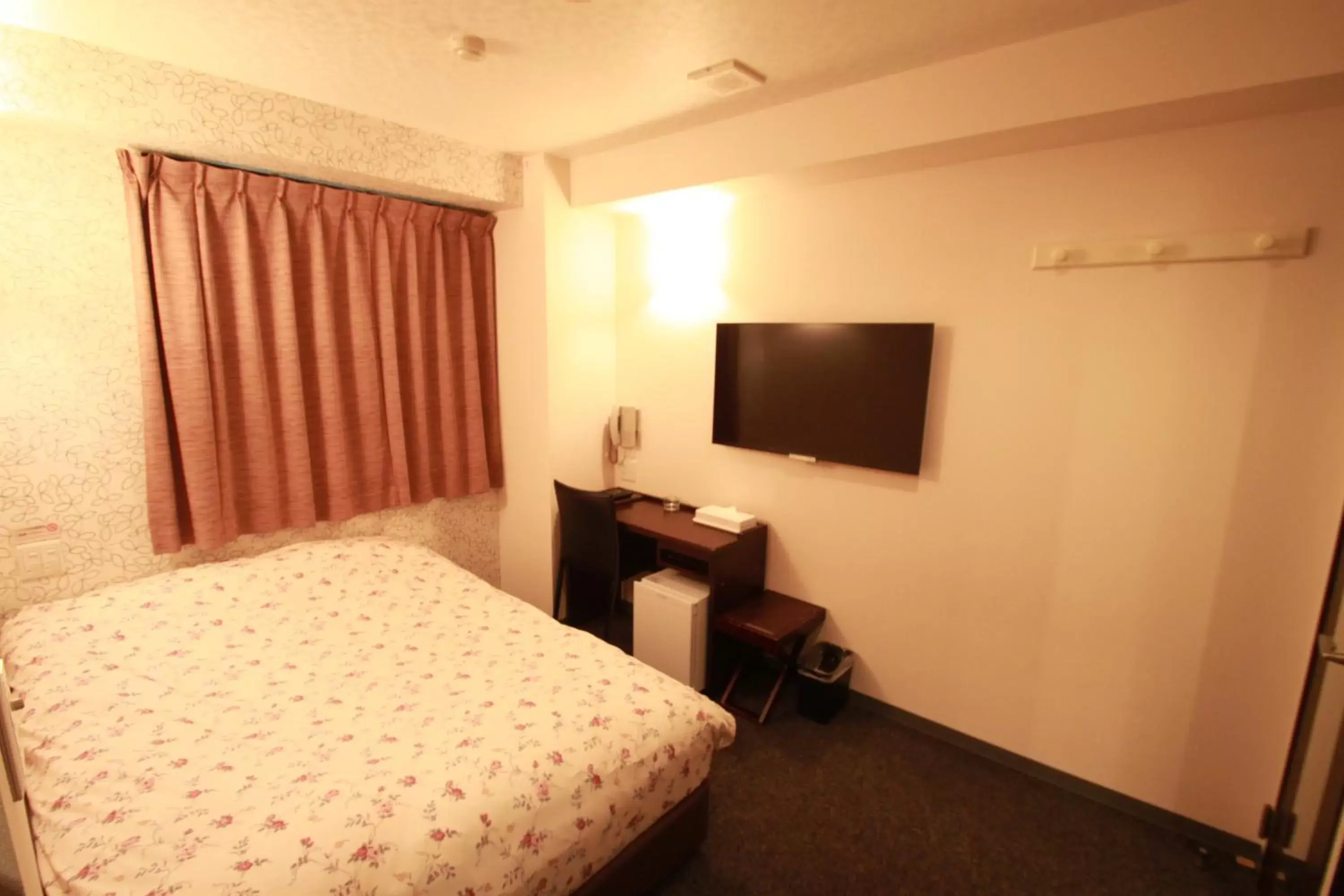 Bed in Toyama Town Hotel