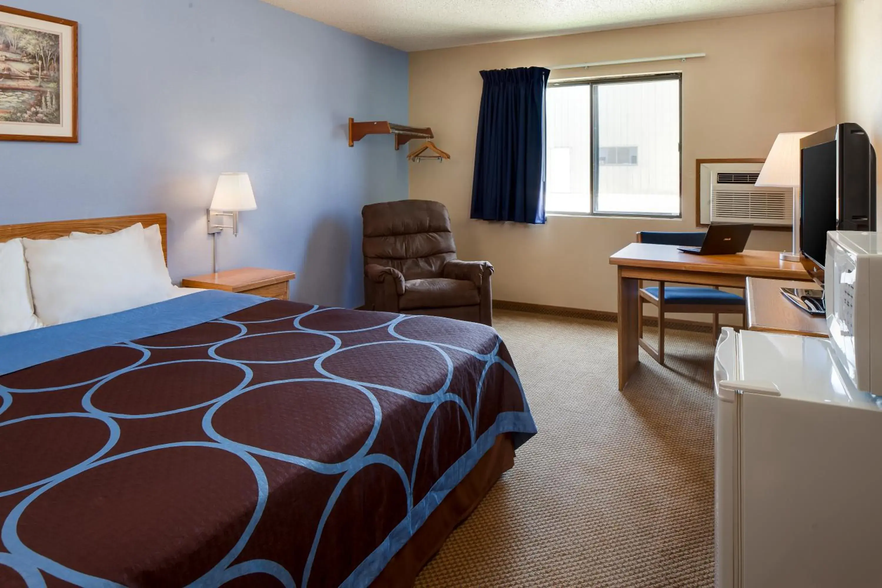 Bed in Super 8 by Wyndham Manhattan KS