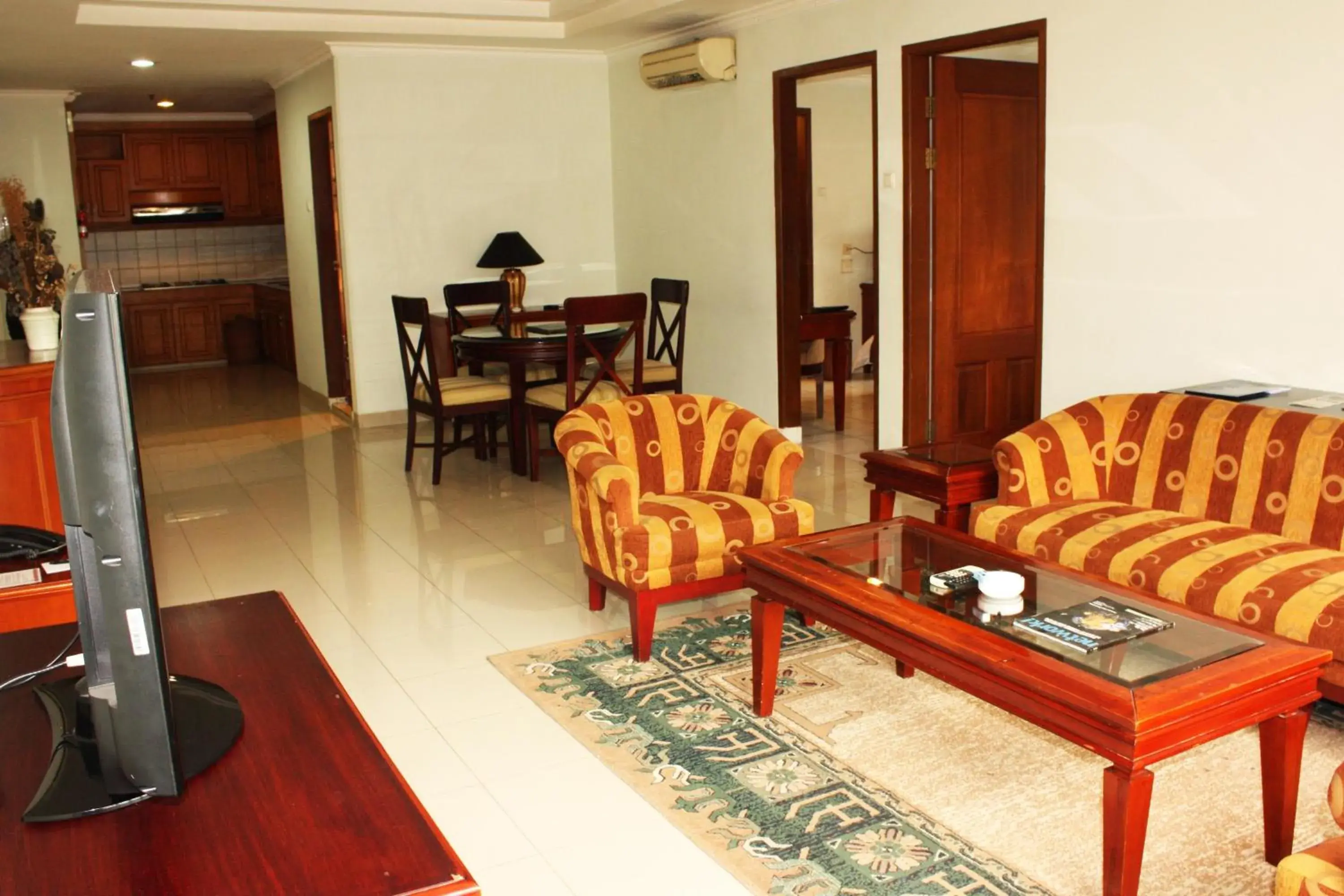 TV and multimedia, Seating Area in Travellers Suites Serviced Apartments