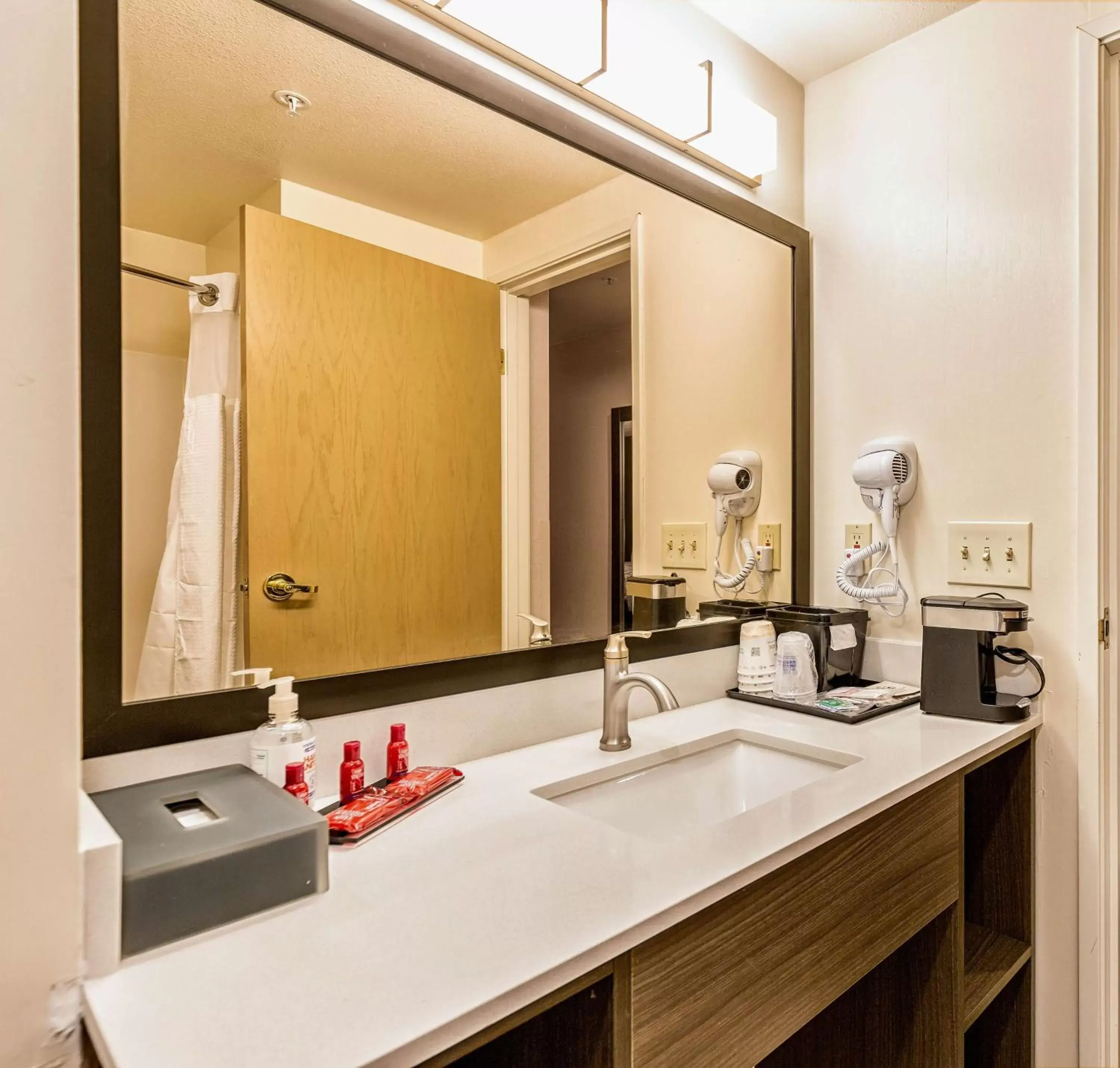 Bathroom in SureStay Plus Hotel by Best Western SeaTac Airport