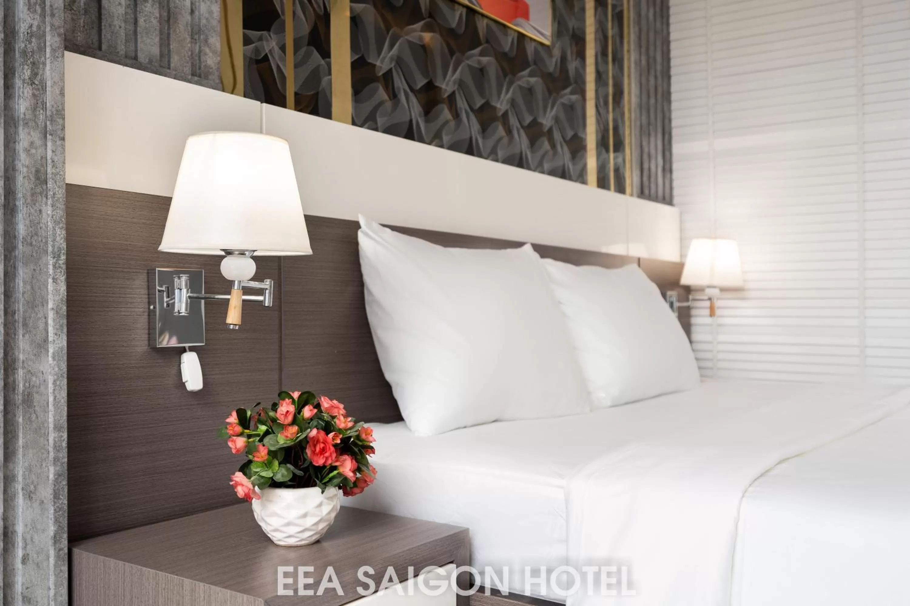 Bed in EEA Central Saigon Hotel