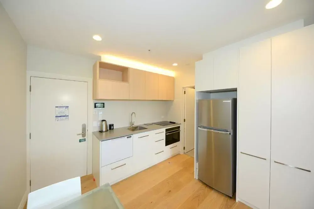 Kitchen/Kitchenette in West Fitzroy Apartments