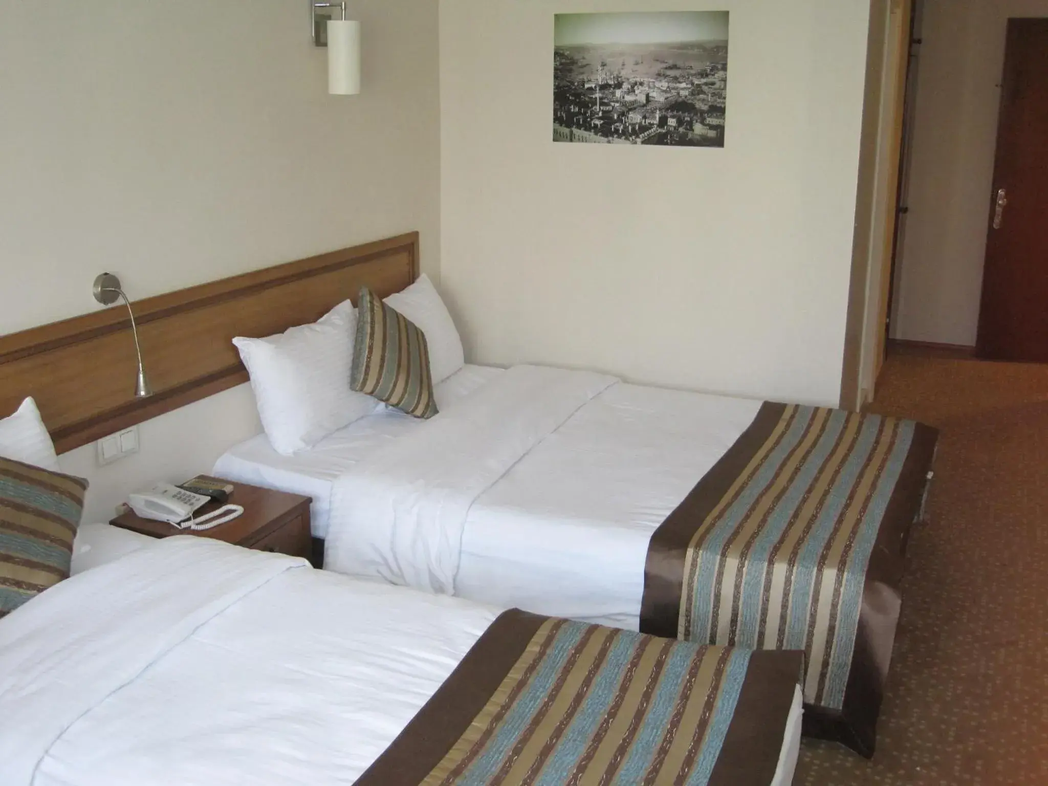 Bed in Avlonya Hotel