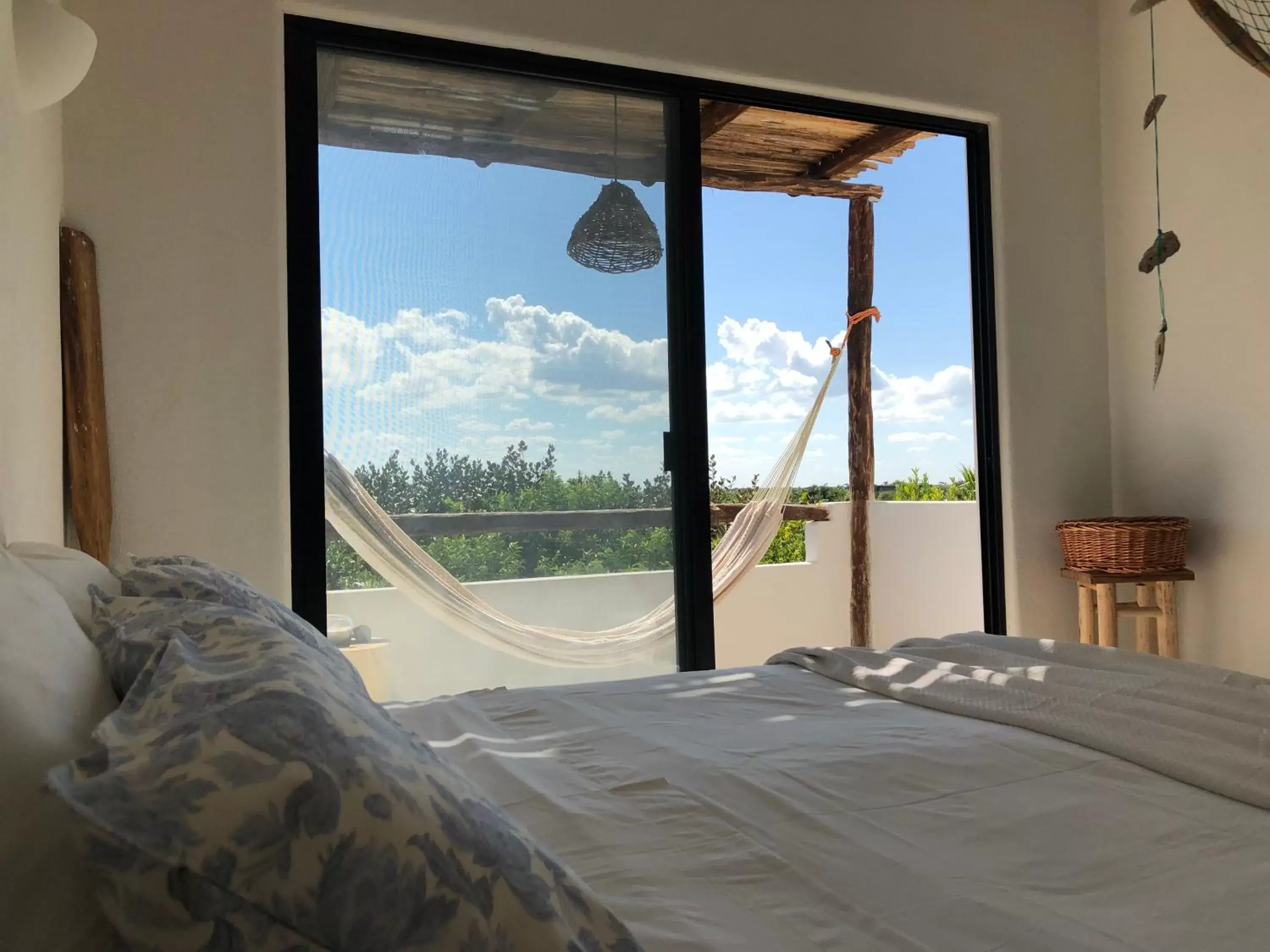 View (from property/room), Bed in LunArena Boutique Beach Hotel Yucatan Mexico