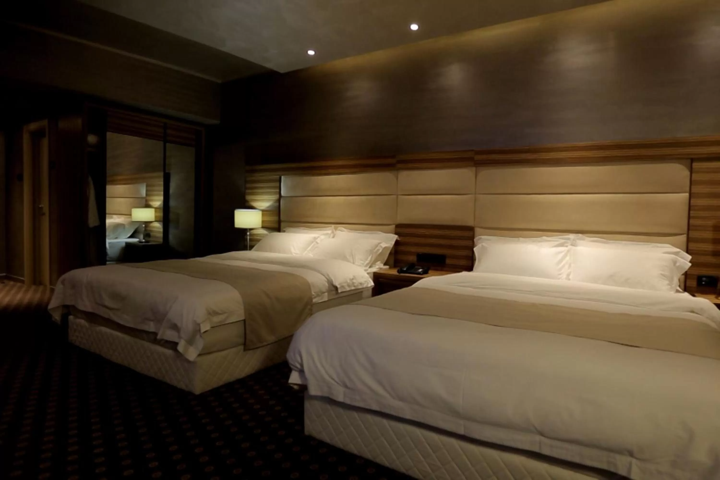 Bed in Orbis Design Hotel & Spa