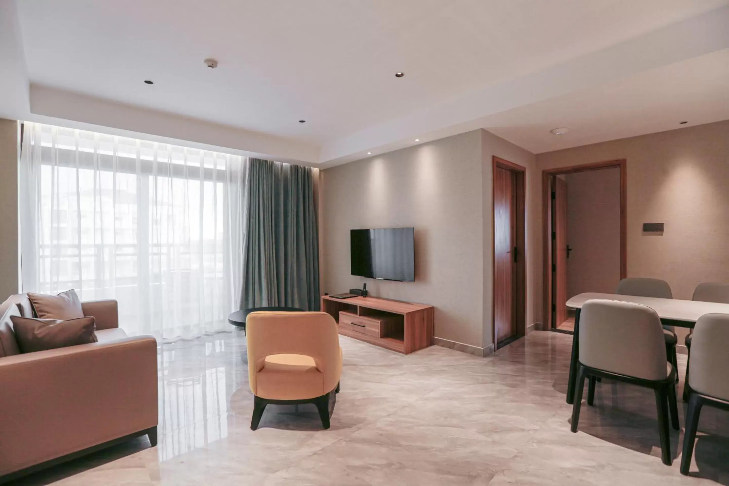 Communal lounge/ TV room, Seating Area in Hotel Casiana Managed by Enderun Hotels