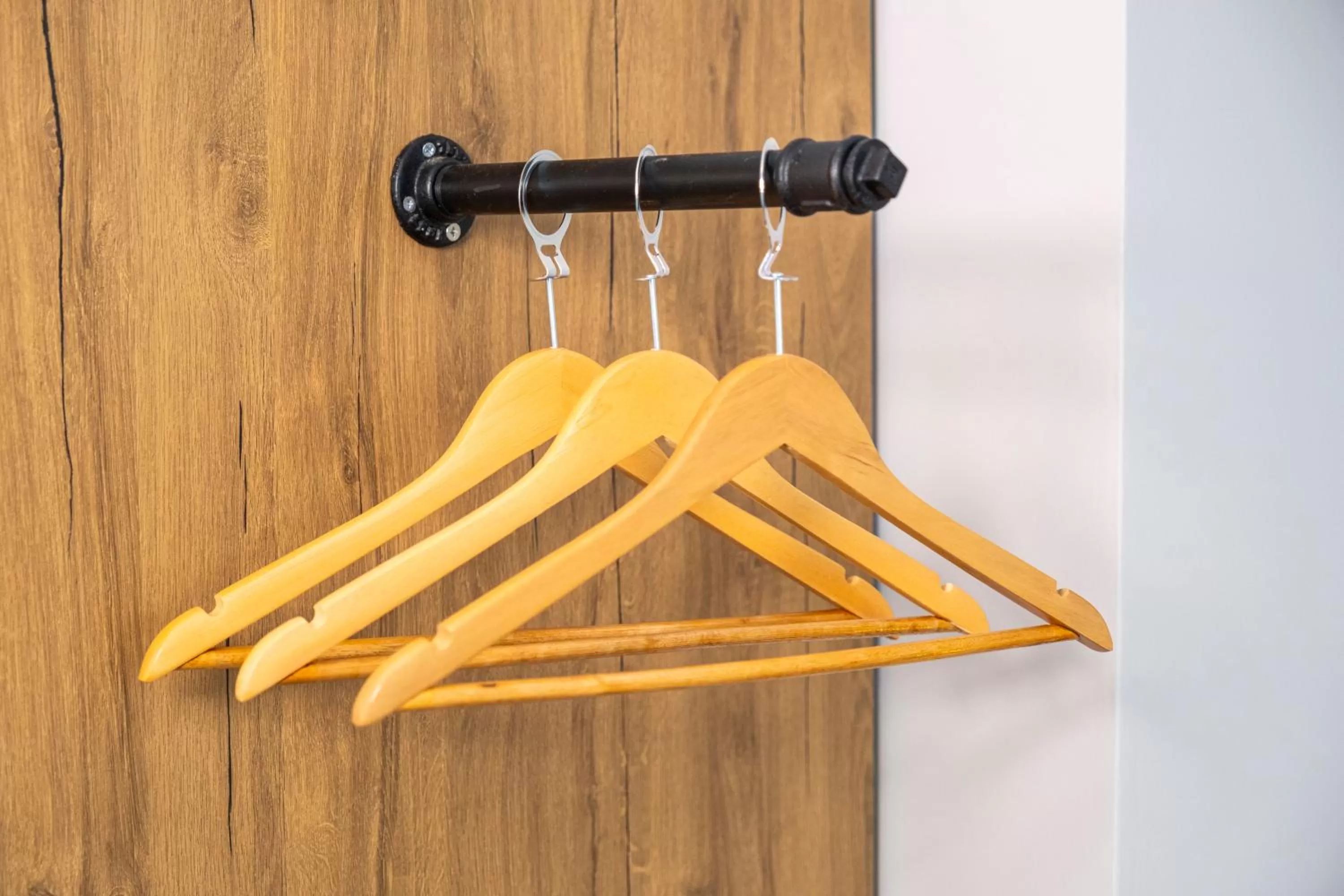 wardrobe in Comfort Center Suit Hotel