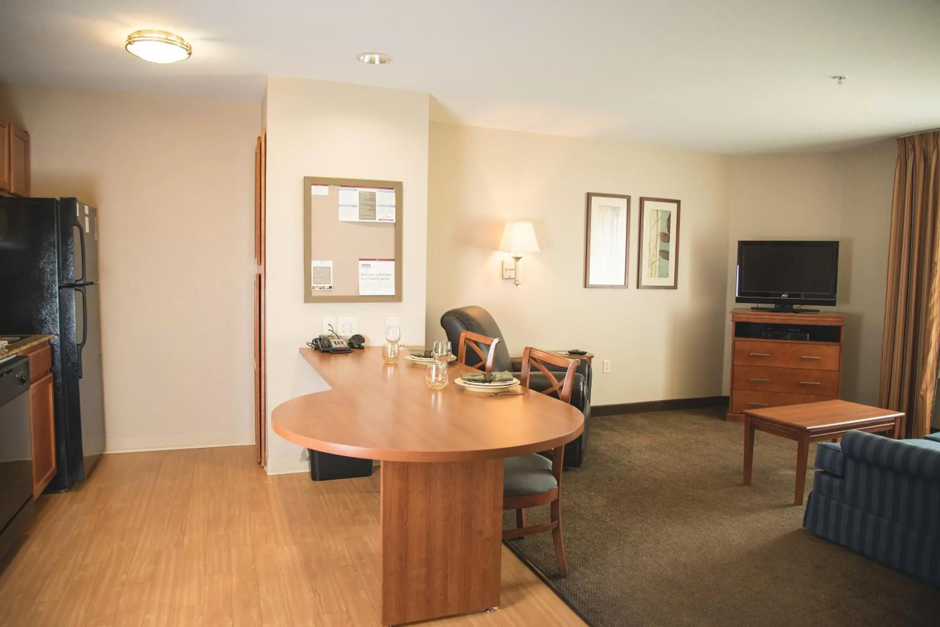 Bedroom, Seating Area in Candlewood Suites Loveland, an IHG Hotel