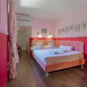 Bed in Villa Ape Rosa Relais