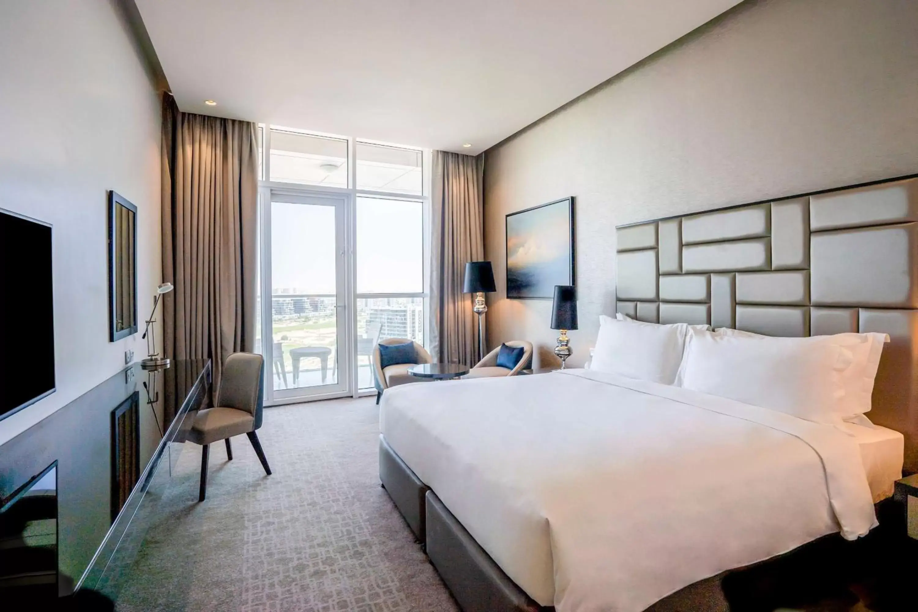 Bedroom, Bed in Radisson Dubai Damac Hills