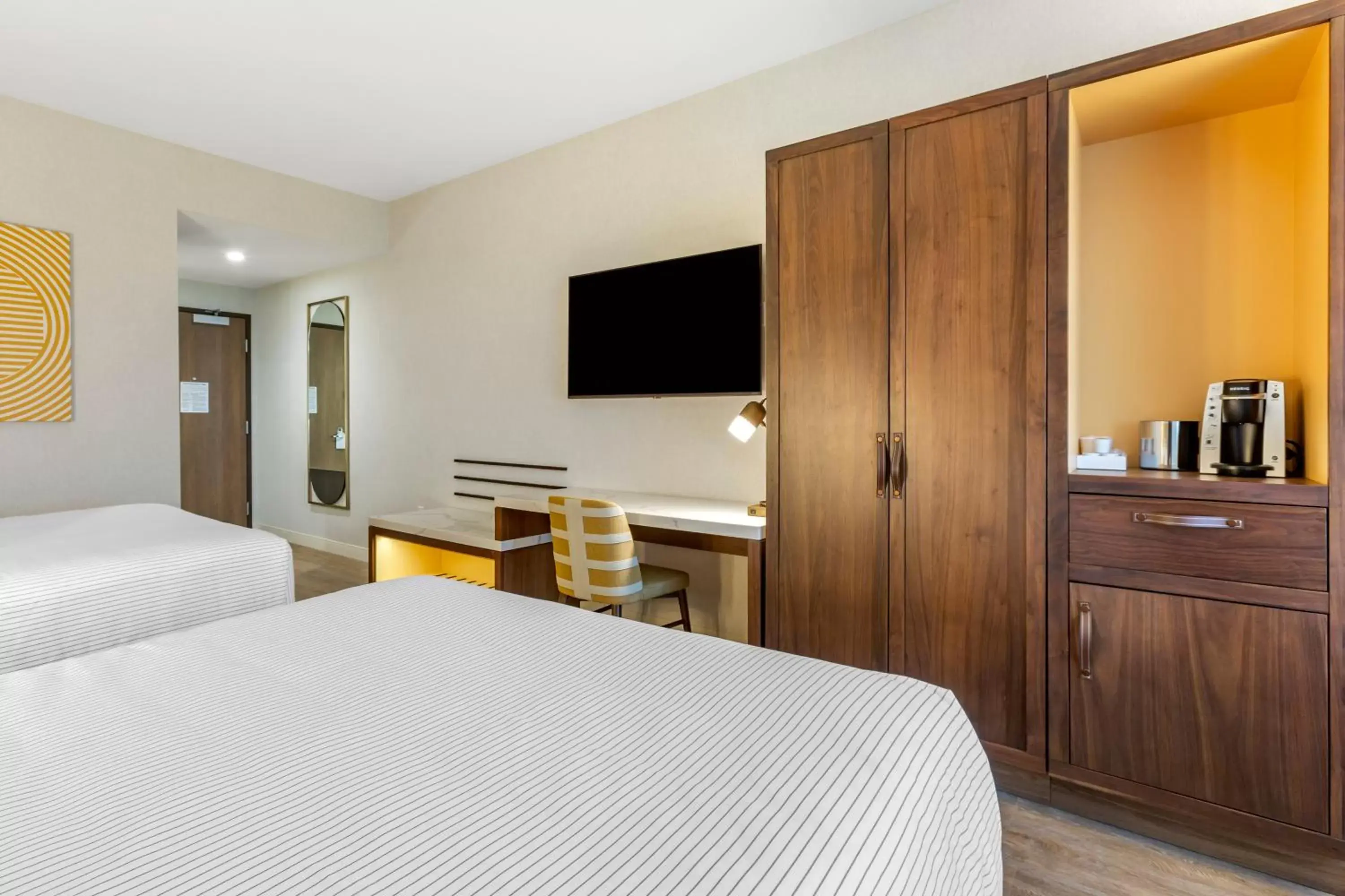 Bed in Cambria Hotel Napa Valley