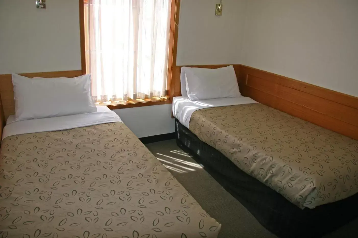 Bed in Hermitage Motor Inn
