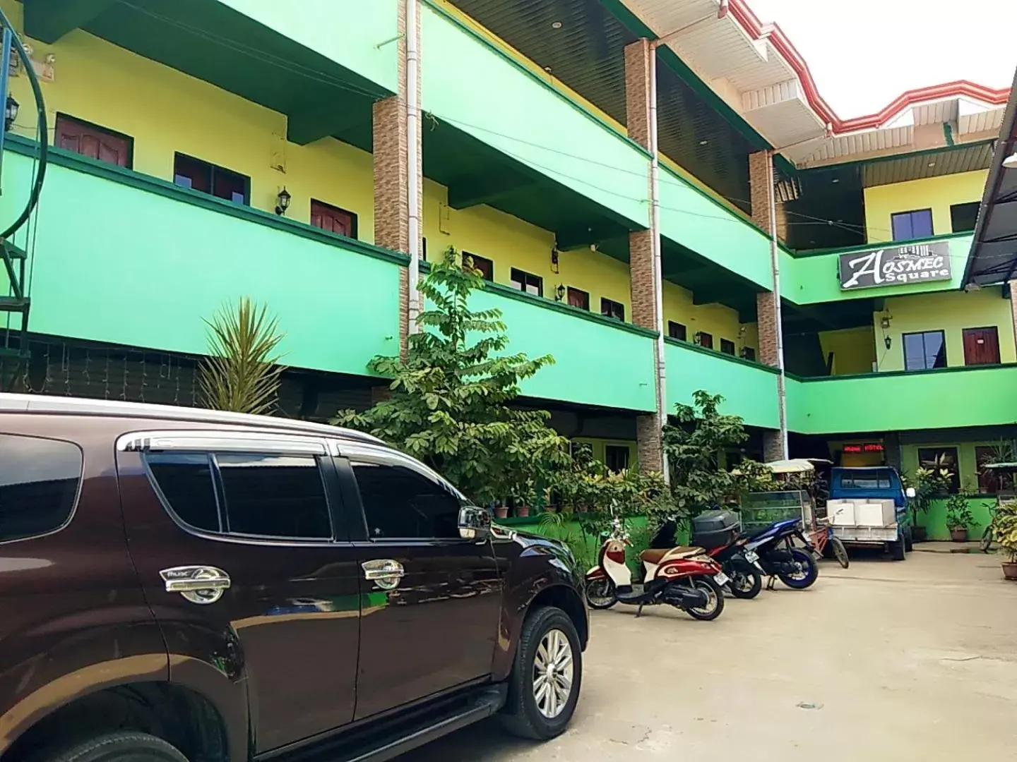 Parking, Property Building in Aosmec Square Hotel