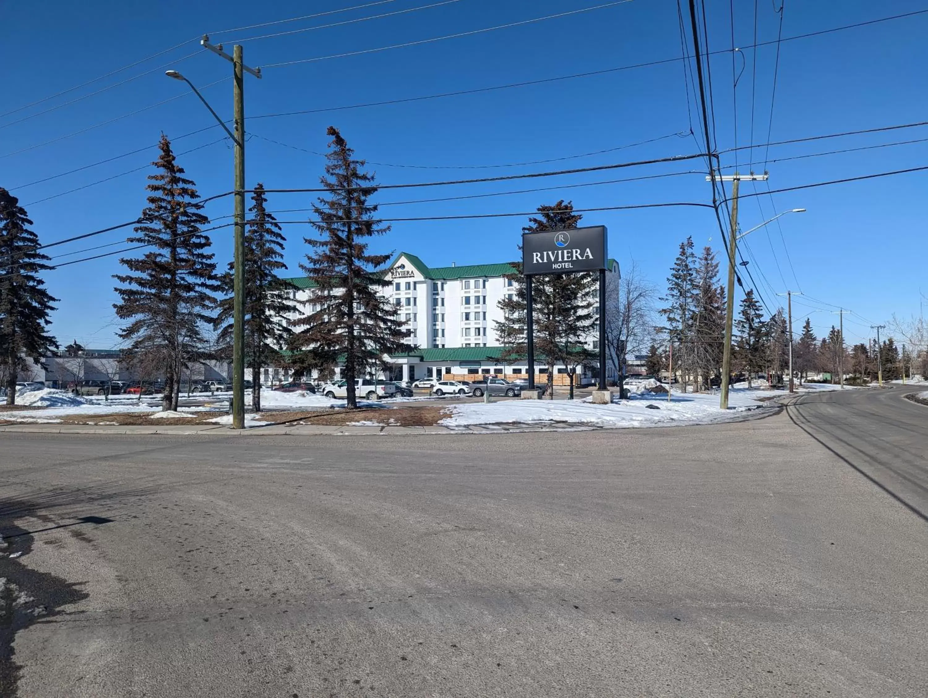 Property building, Winter in DIVYA SUTRA Riviera Plaza and Conference Centre Calgary Airport