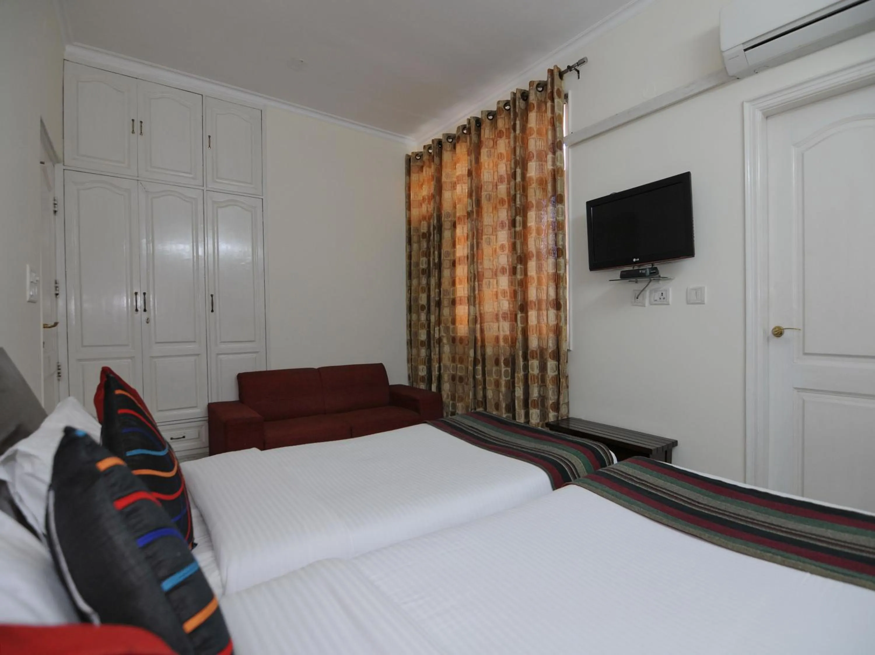 Bedroom, Bed in Mehra Residency at The Airport