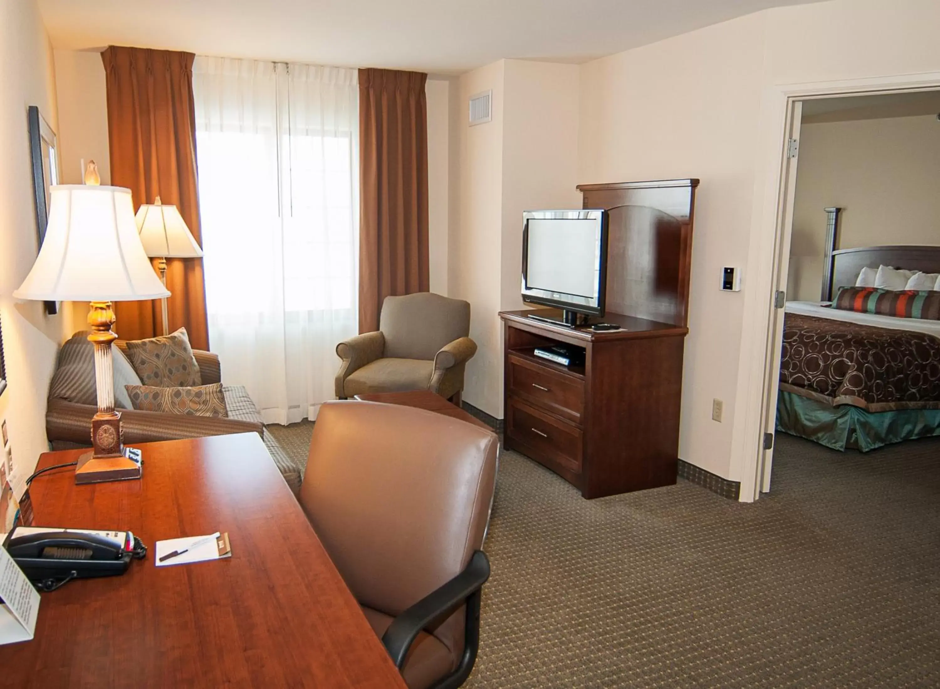 Photo of the whole room, Seating Area in Staybridge Suites Wichita, an IHG Hotel