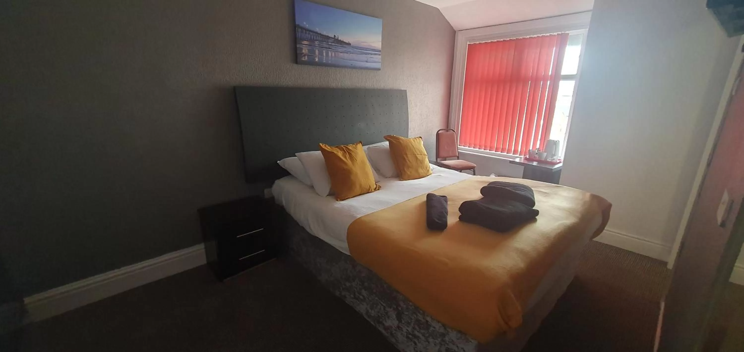 Bed in Palm Beach Hotel by the Sea