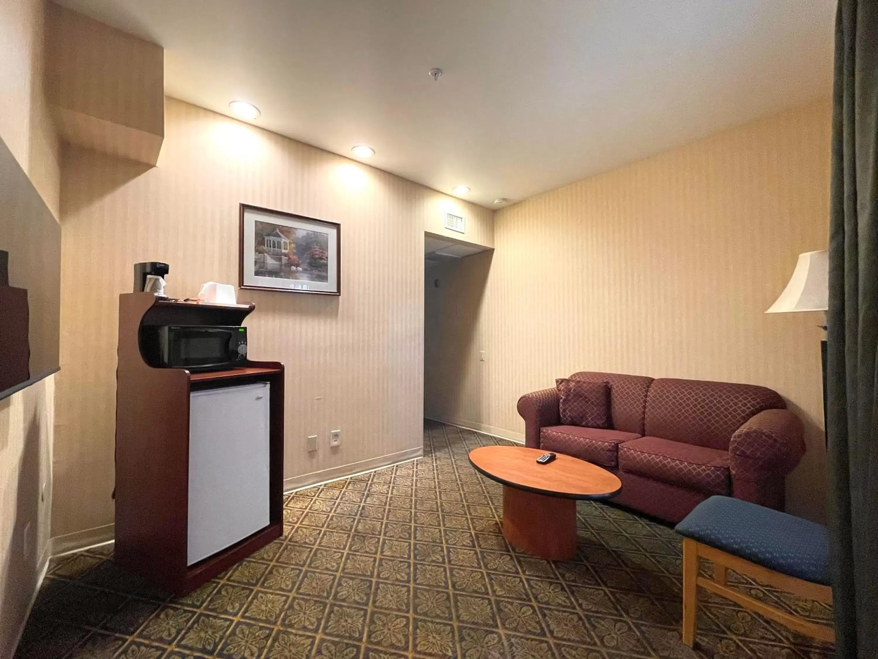 Living room, TV/Entertainment Center in Ramada by Wyndham South El Monte