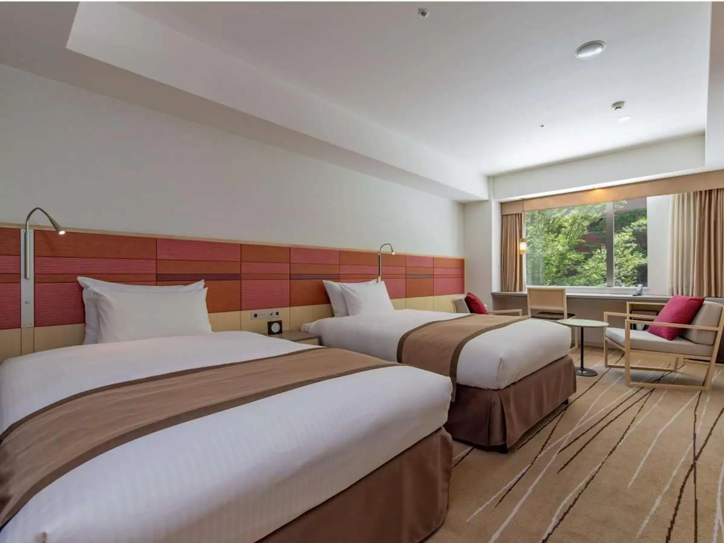 Bed in JR Kyushu Hotel Blossom Hakata Central