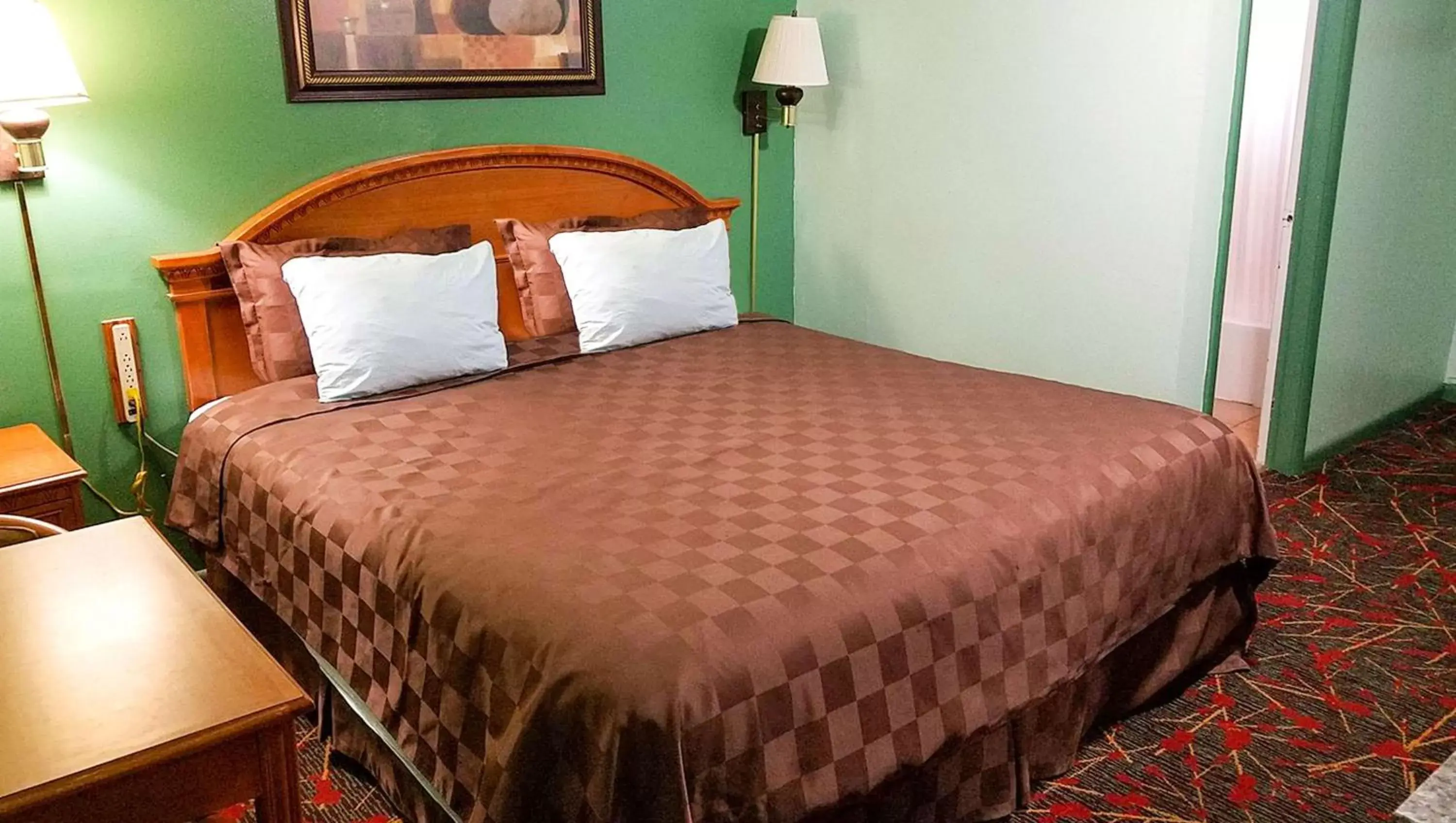 Photo of the whole room, Bed in American Inn & Suites Childress
