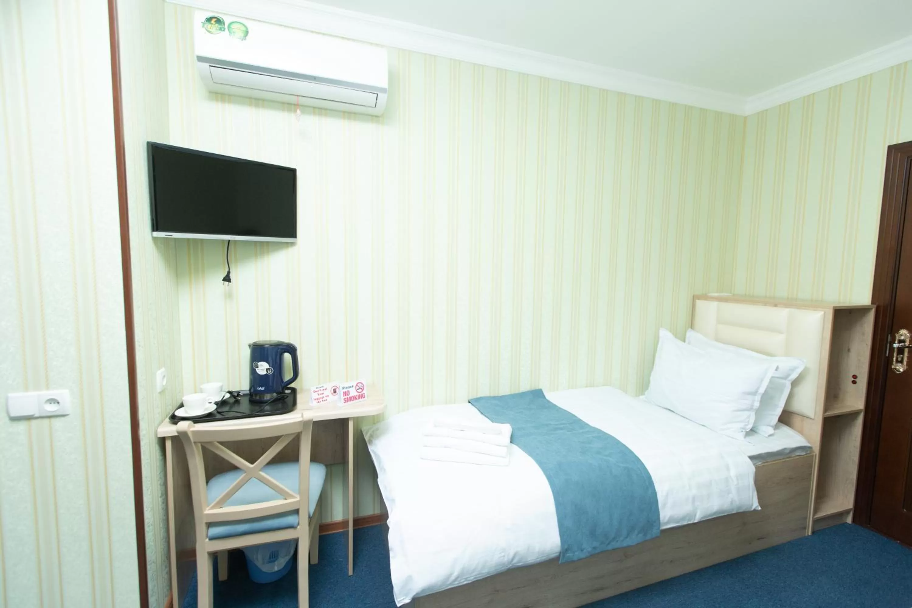 Bed in Mirzo Boutique Hotel