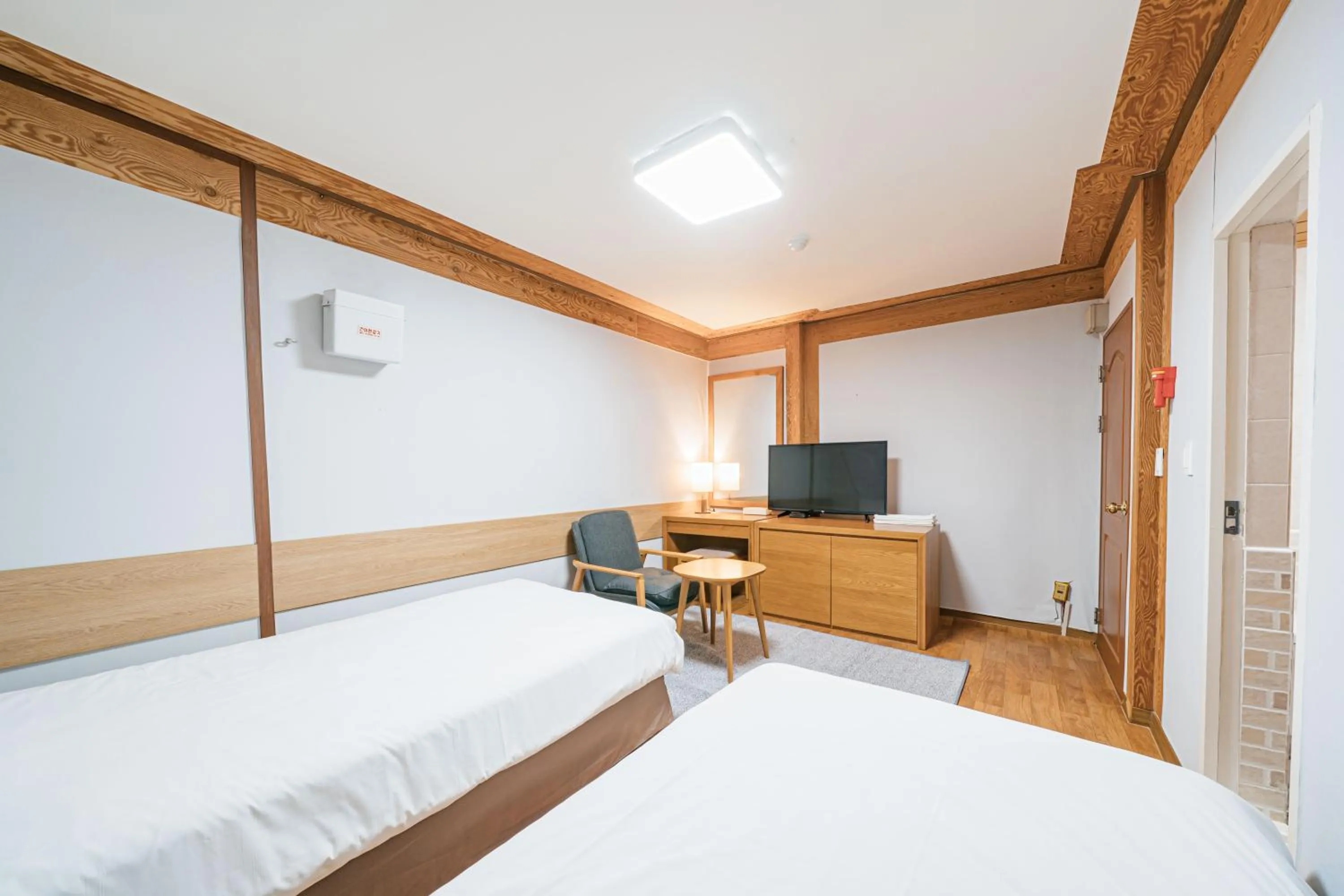 Bed in Jeju Miracle Hotel