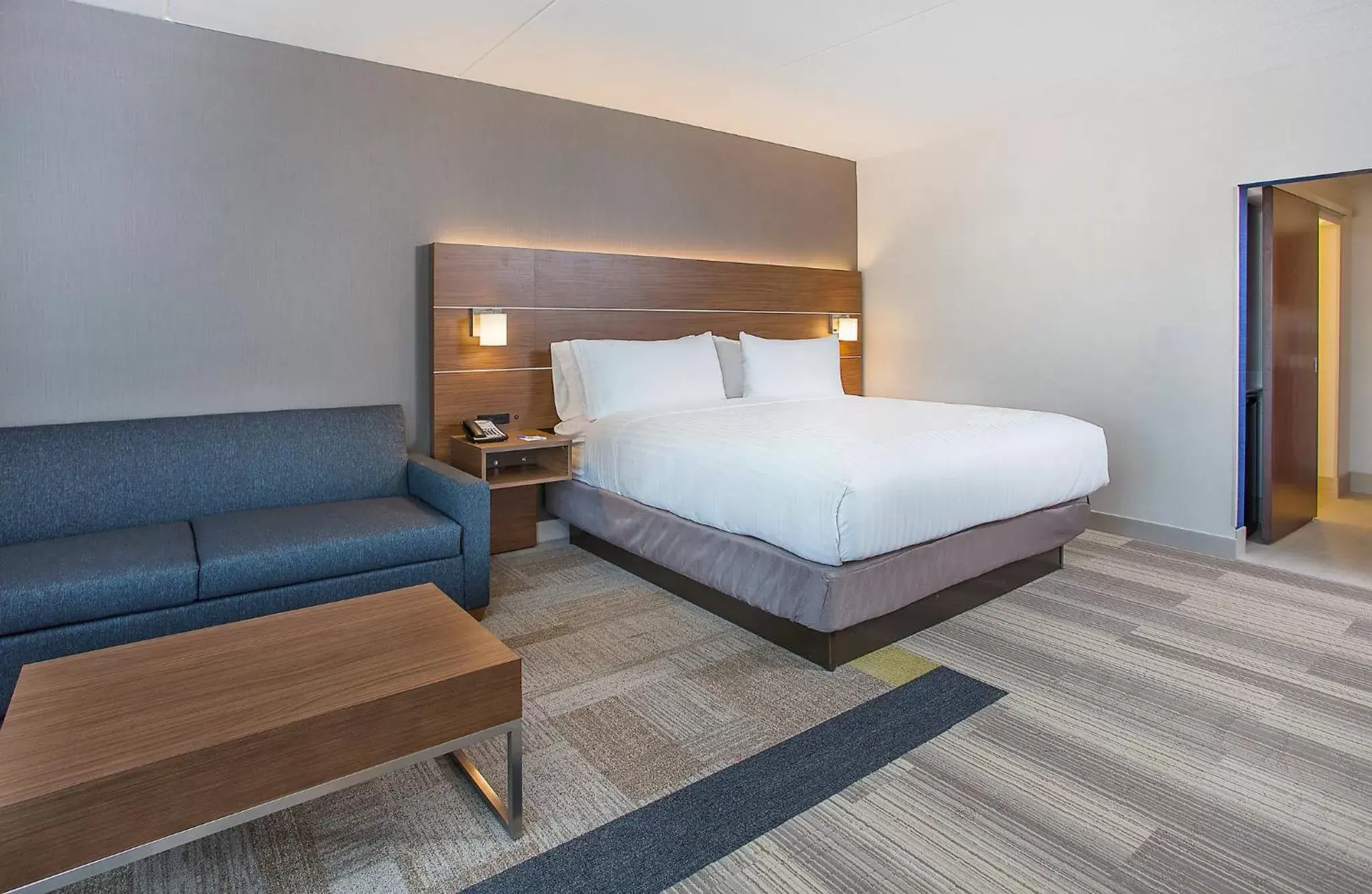 Bedroom, Bed in Holiday Inn Express & Suites Covington, an IHG Hotel