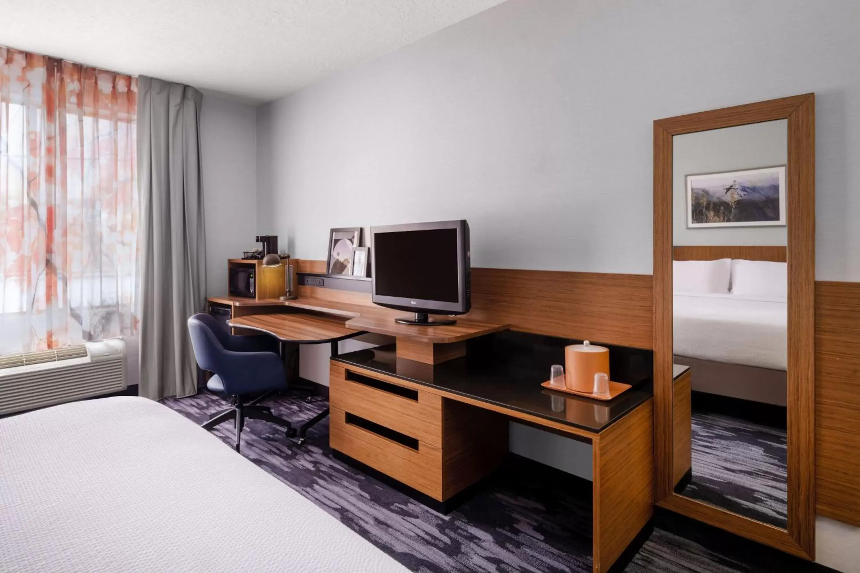 Photo of the whole room, TV/Entertainment Center in Fairfield Inn & Suites by Marriott Salt Lake City Downtown