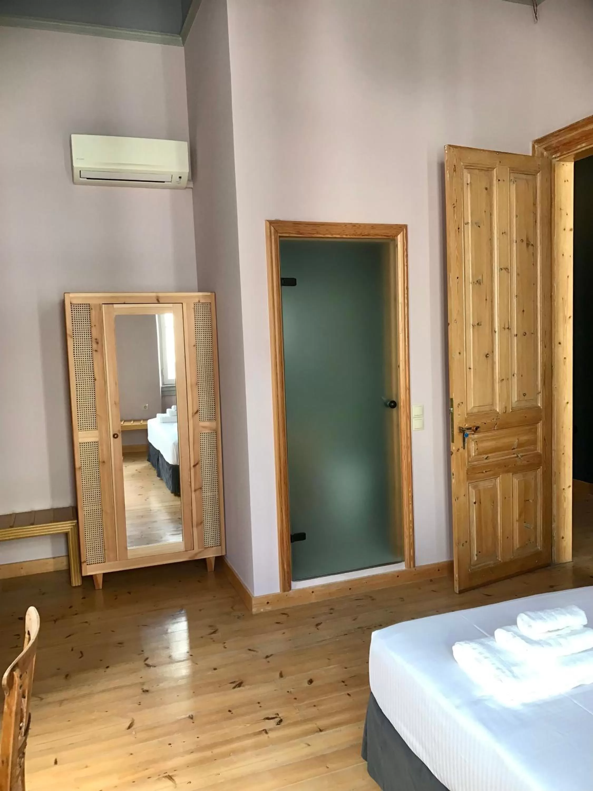 Photo of the whole room in VASILIKON Hotel 1888 the past is present HISTORICAL PRESERVATION MONUMENT