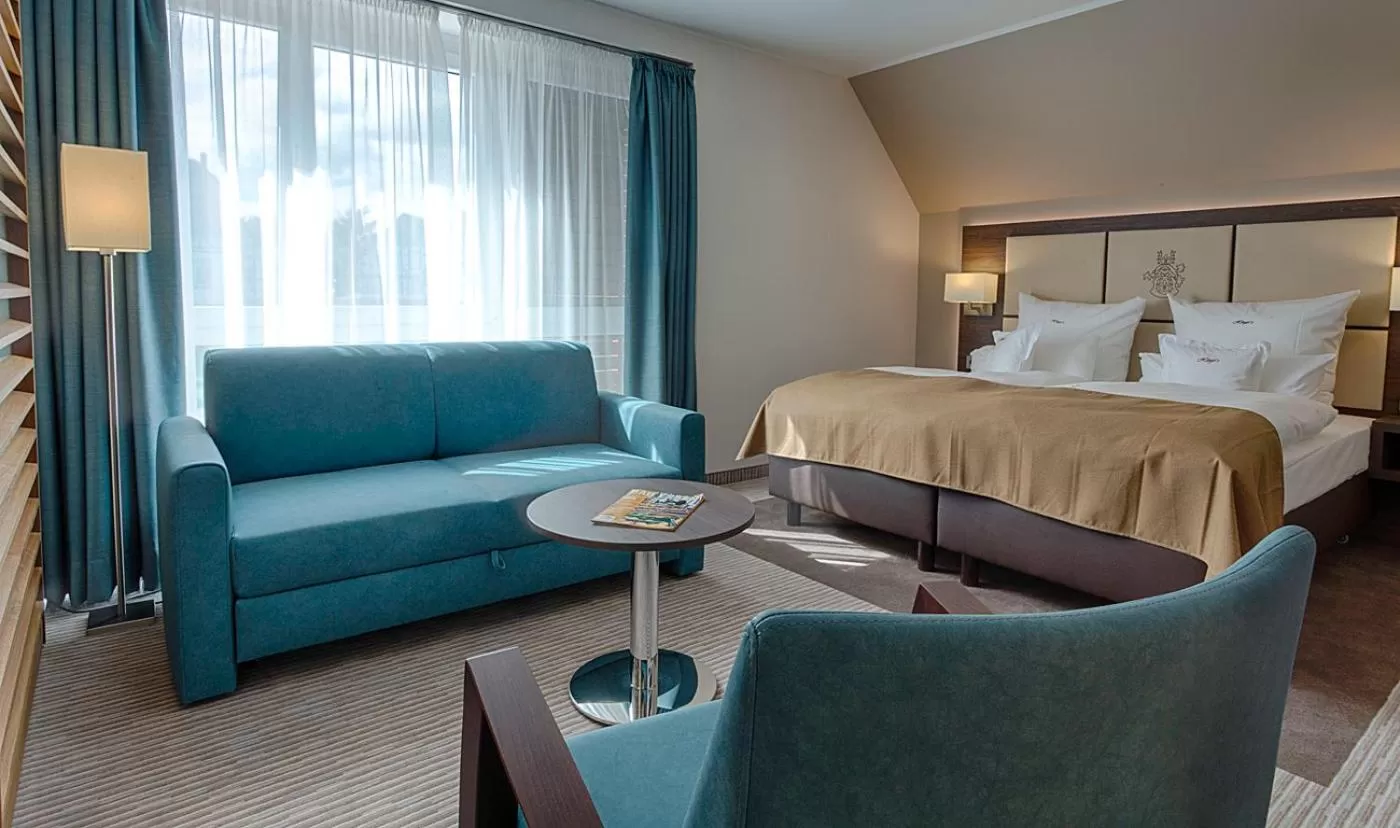 Photo of the whole room, Bed in Höger's Hotel & Restaurant