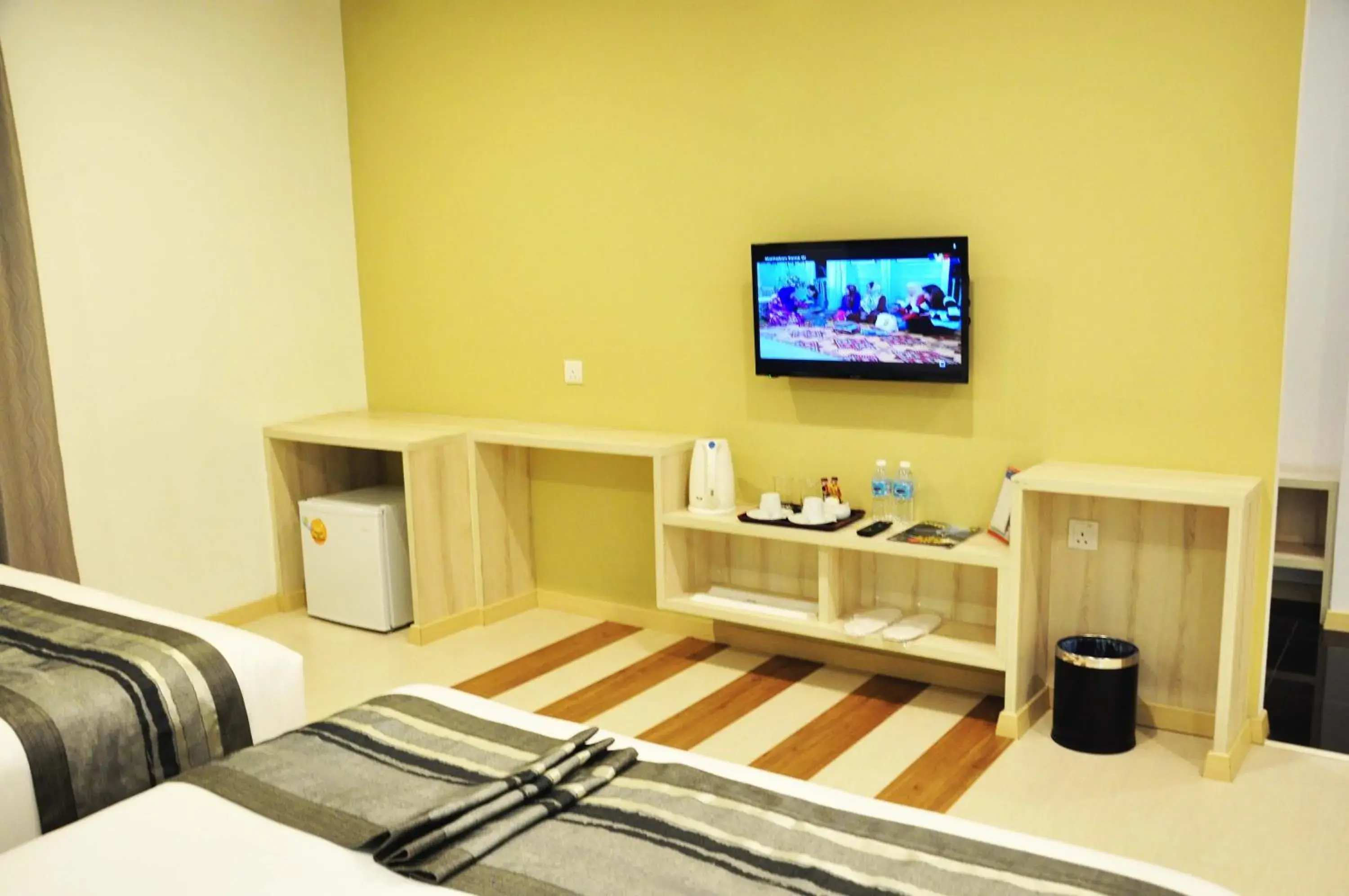 Staff, TV/Entertainment Center in Valya Hotel