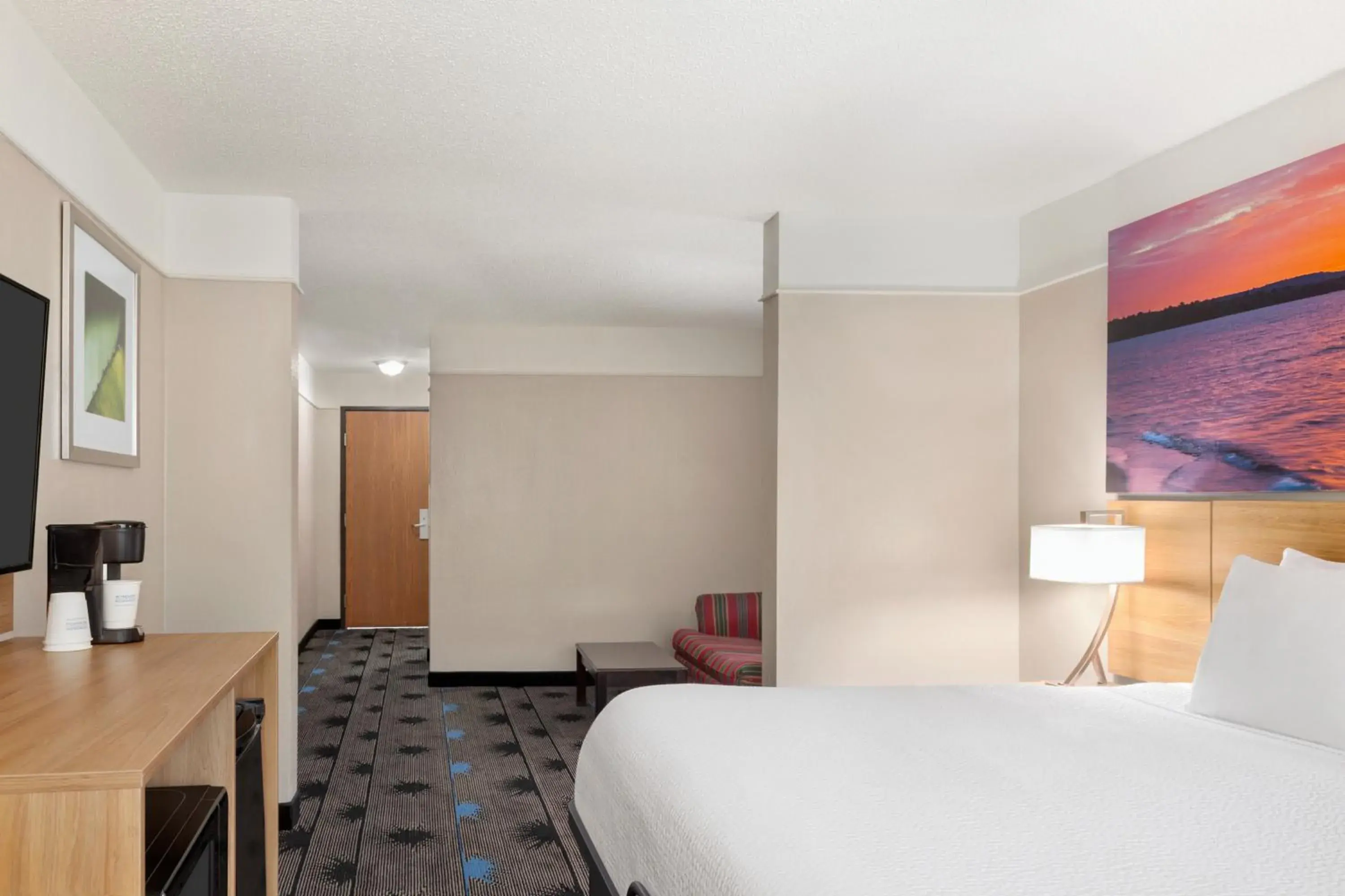 Bed in Days Inn by Wyndham Kansas City International Airport