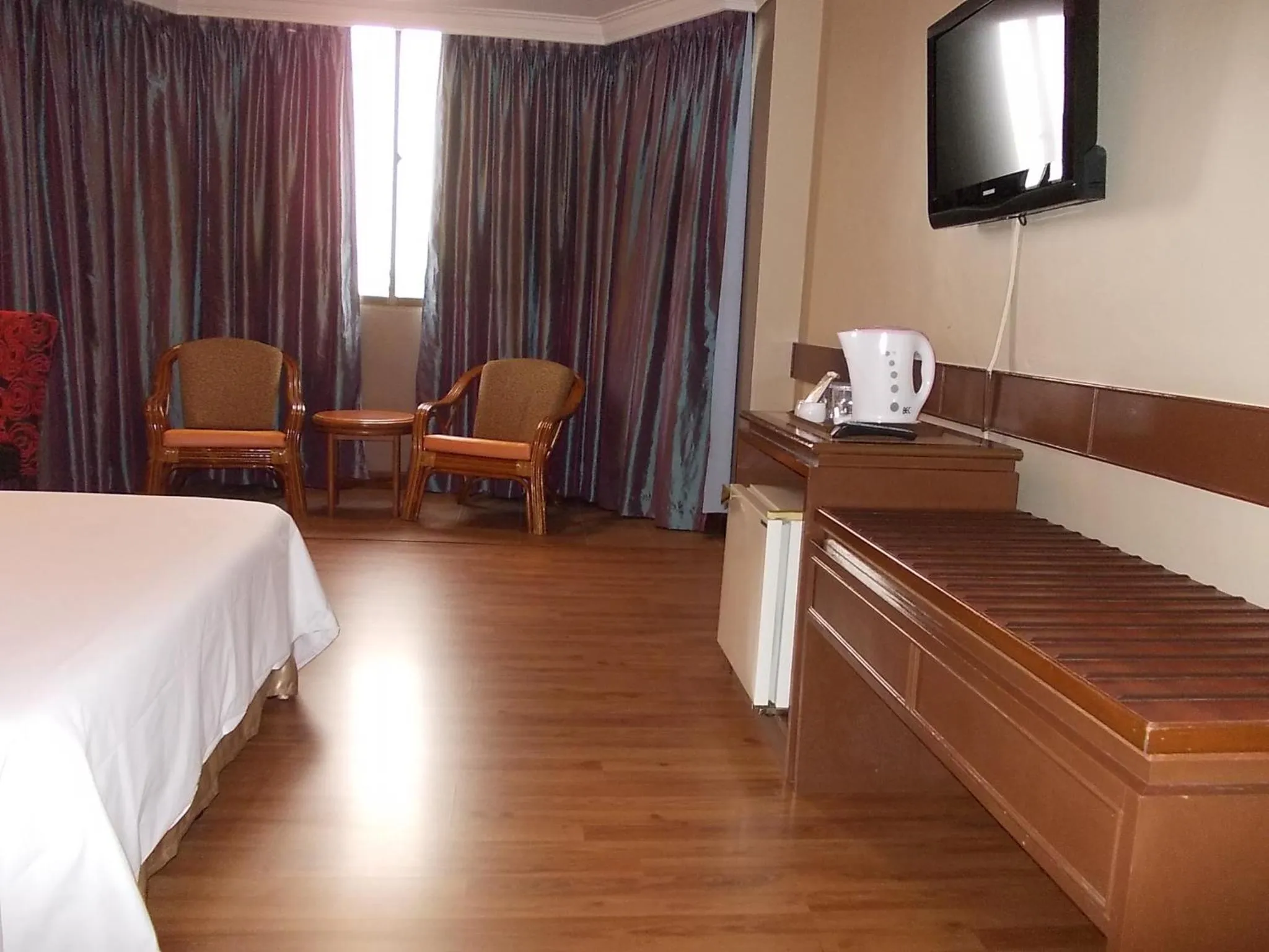 Bed in Hotel Grand Crystal