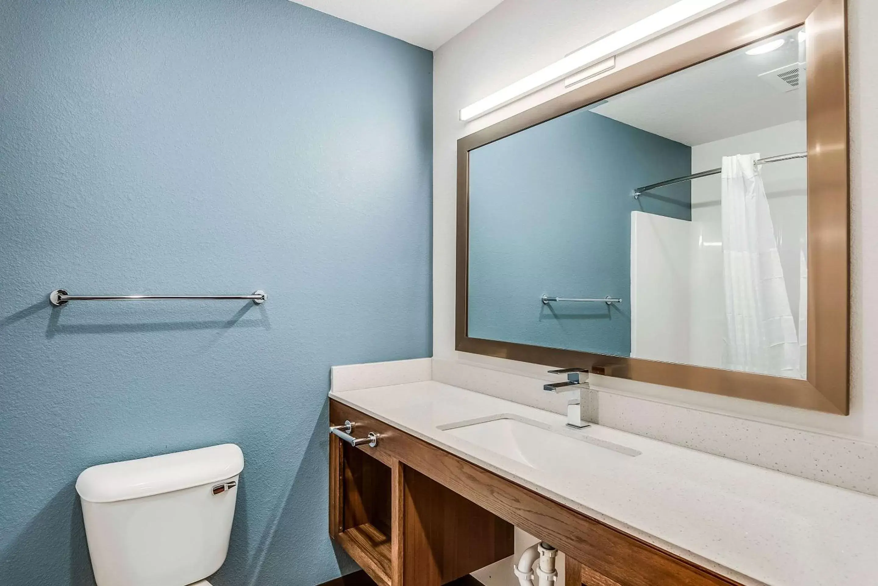 Bathroom in WoodSpring Suites West Des Moines