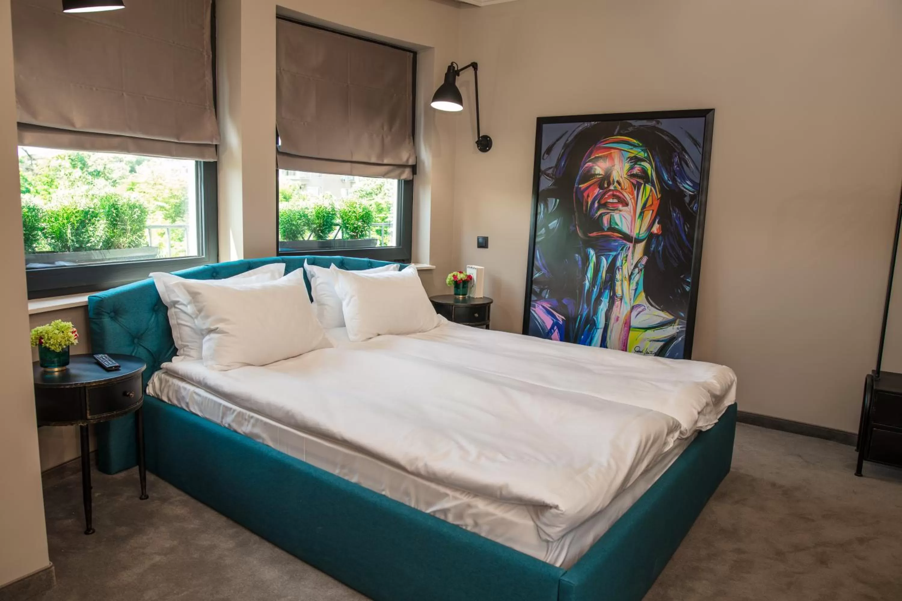 Bed in Reverence Boutique Hotel