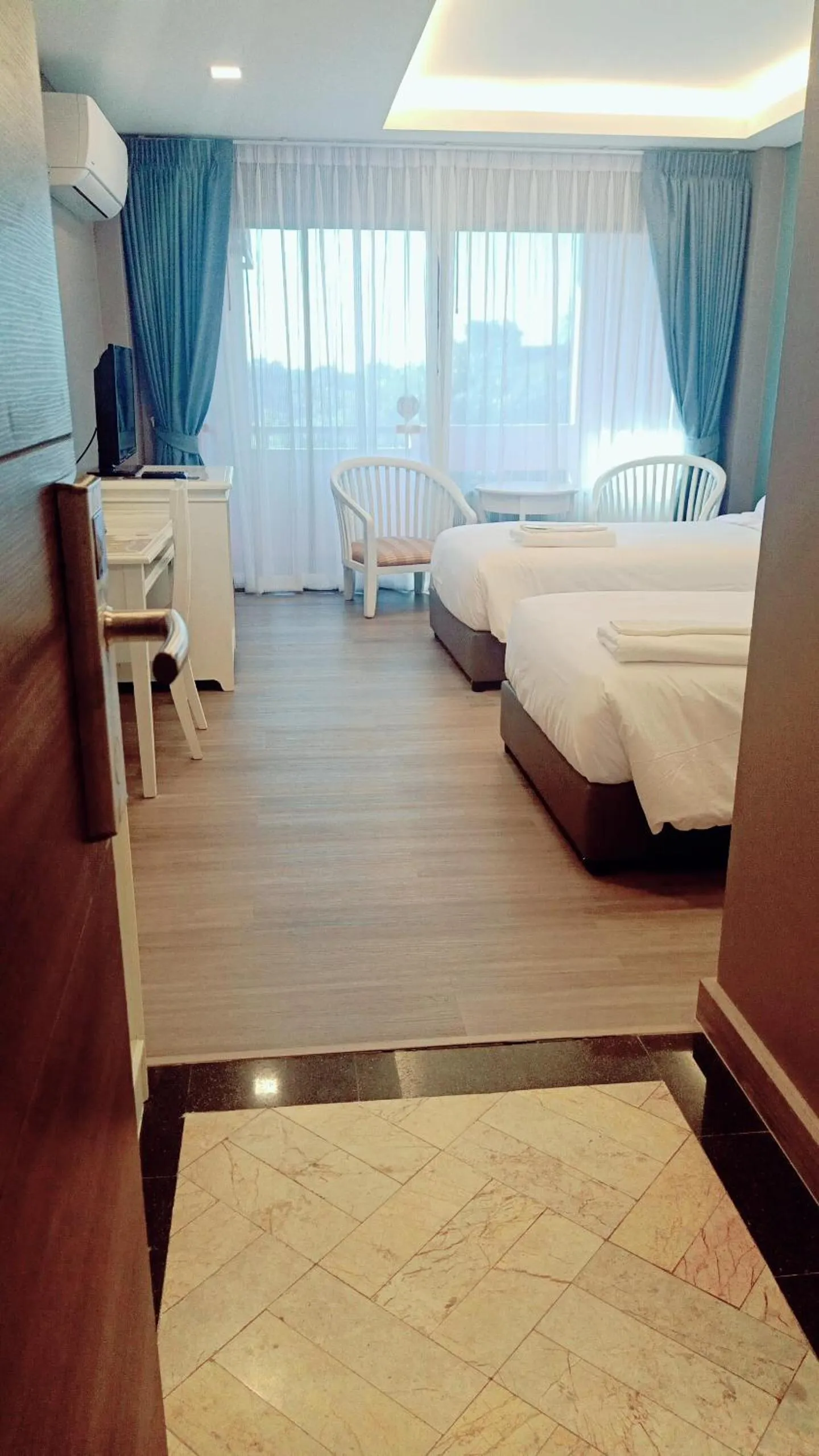 Bed in Chiangmai Gate Hotel