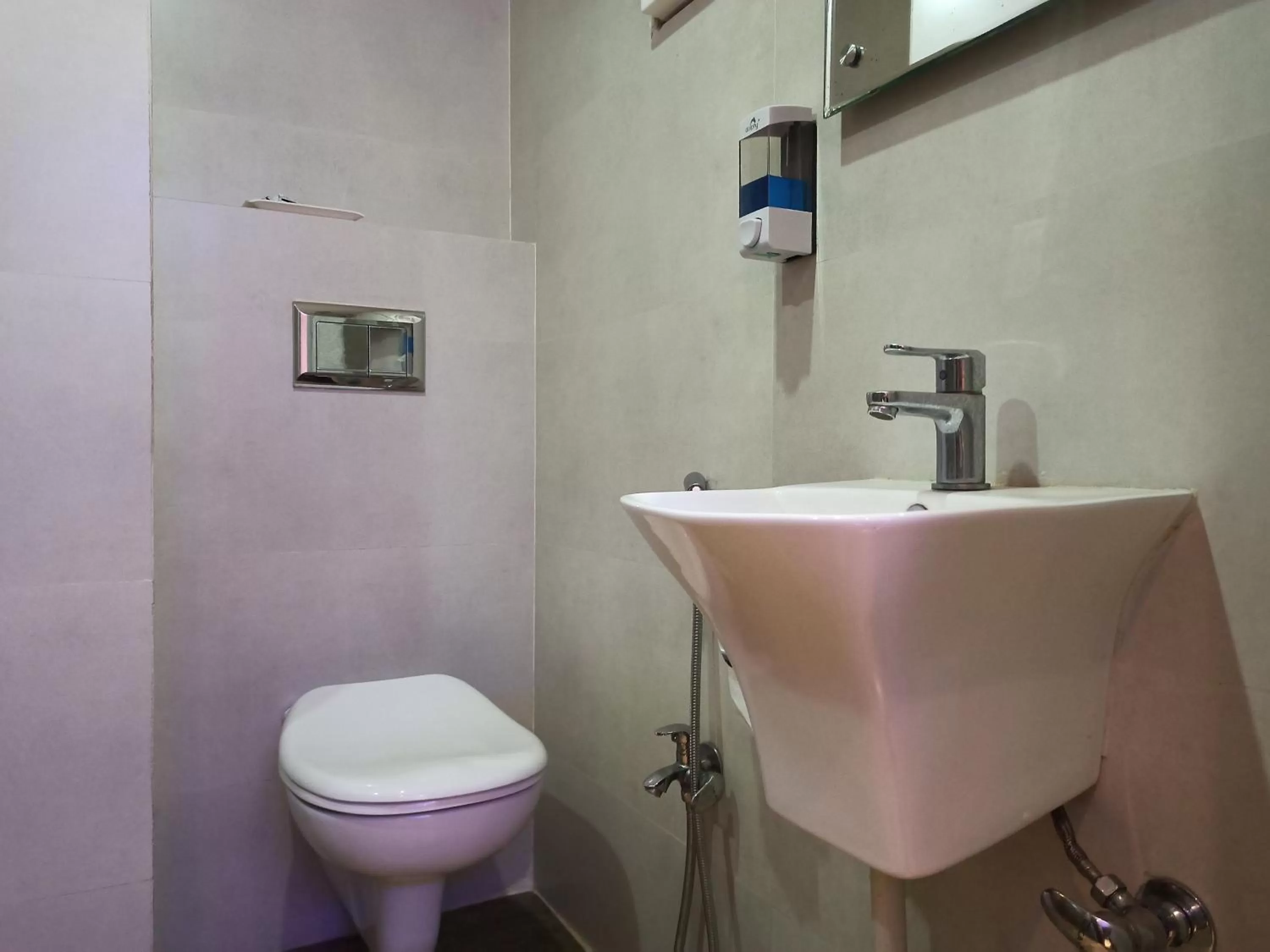 Bathroom in Hotel A P Home's - A Boutique Hotel