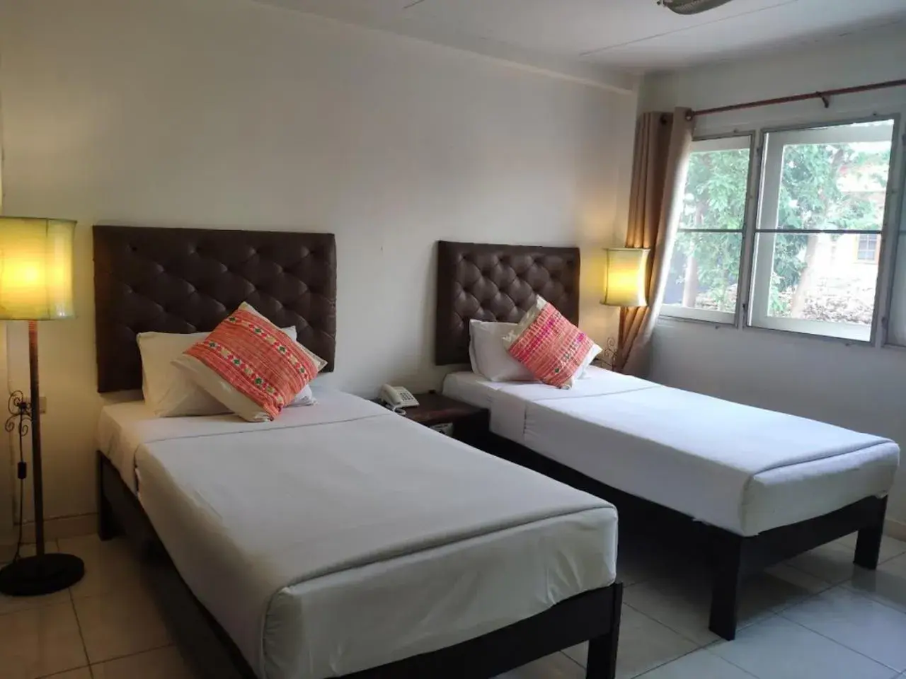 Bed in Changpuak Hotel