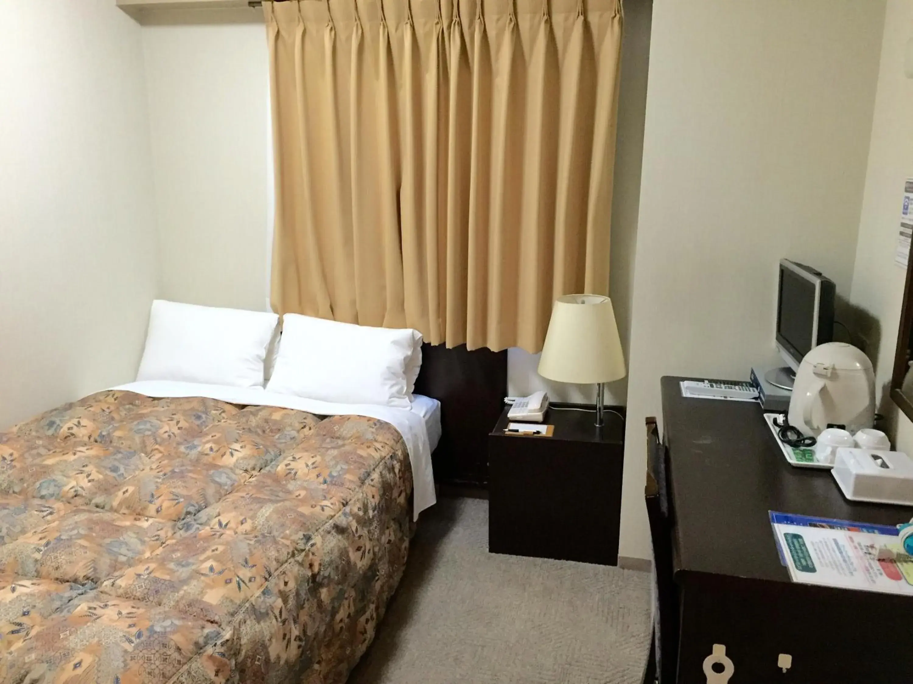 Photo of the whole room, Bed in Hotel Crown Hills Toyama