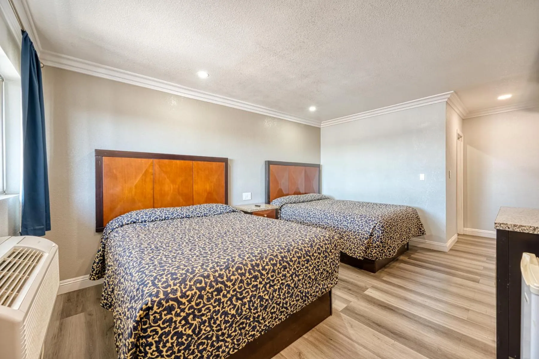 Bed in ERTH INN by AGA- Mojave