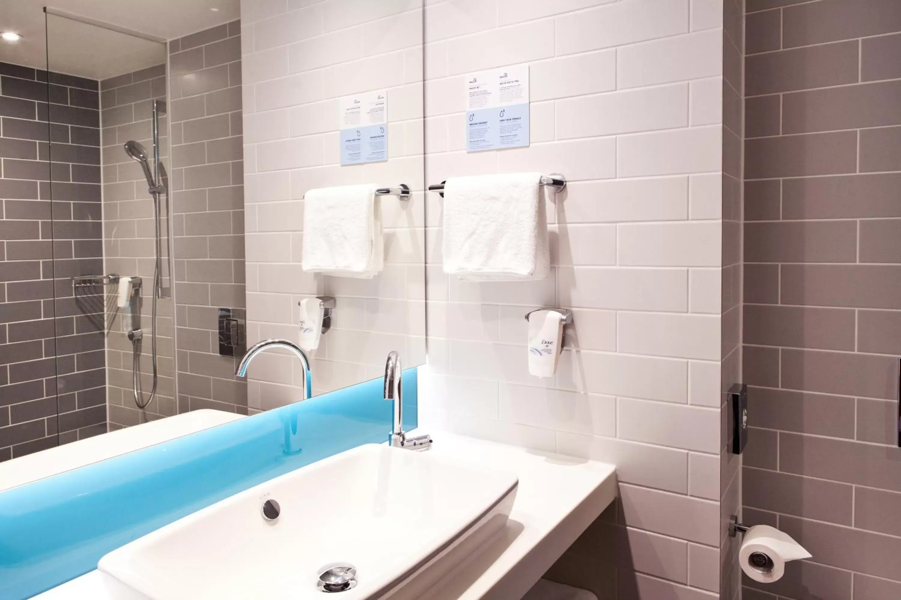 Bathroom in Holiday Inn Express & Suites - Basel - Allschwil, an IHG Hotel