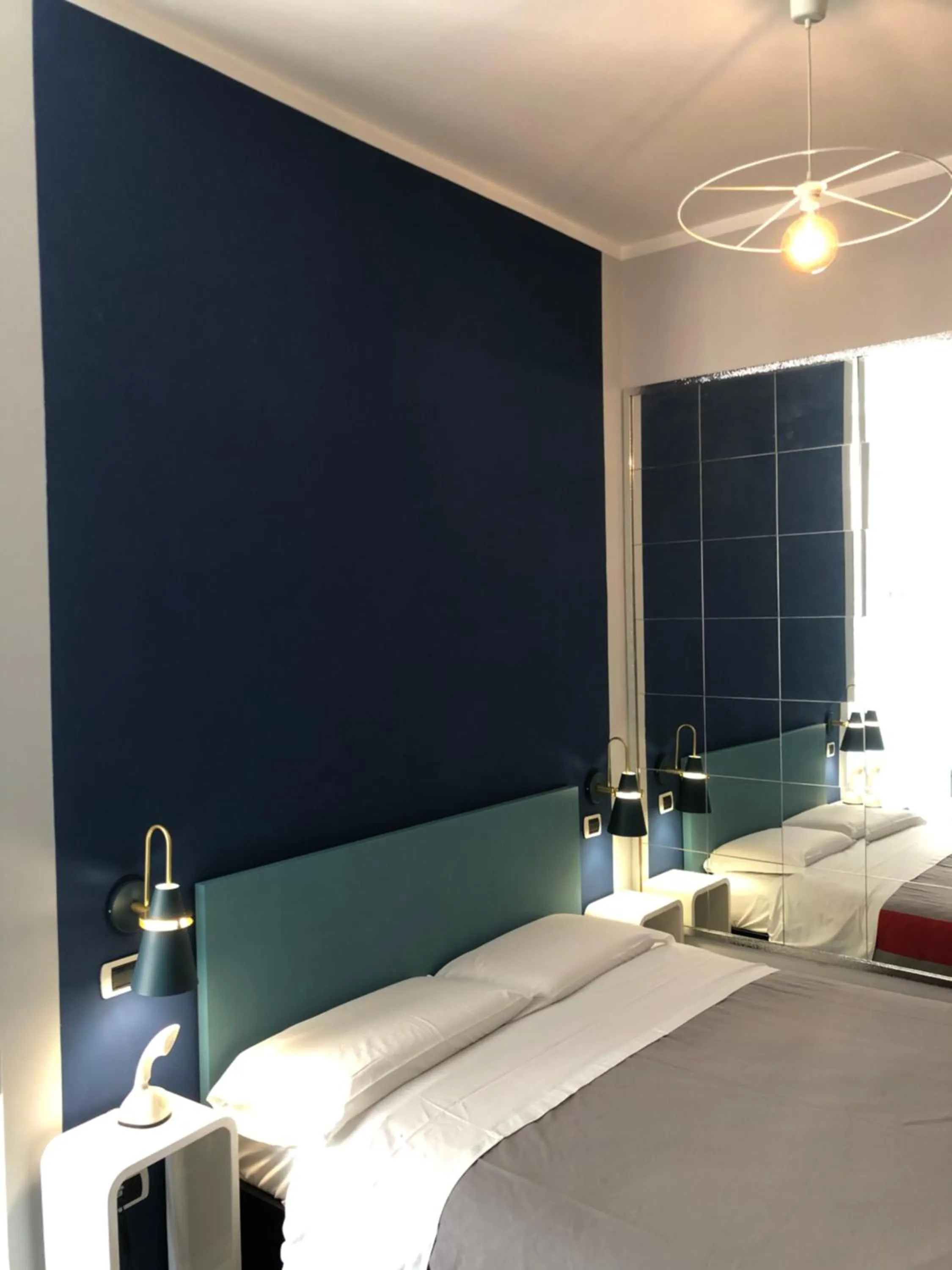 Bed in H Rooms boutique Hotel