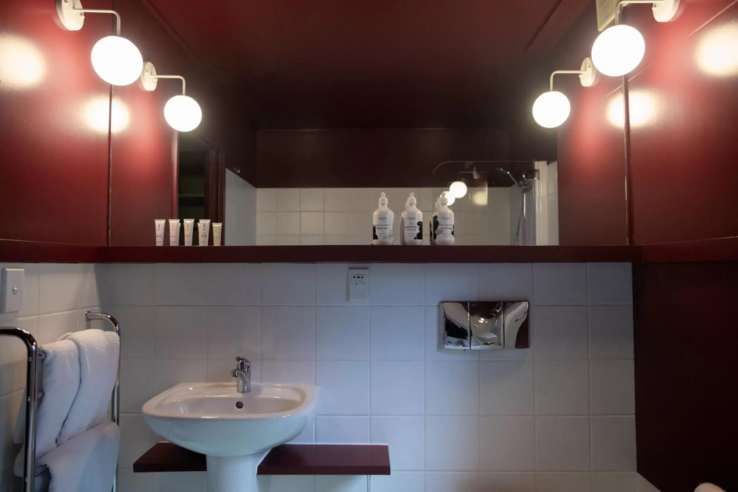 Bathroom in The Central Private Hotel by Naumi Hotels