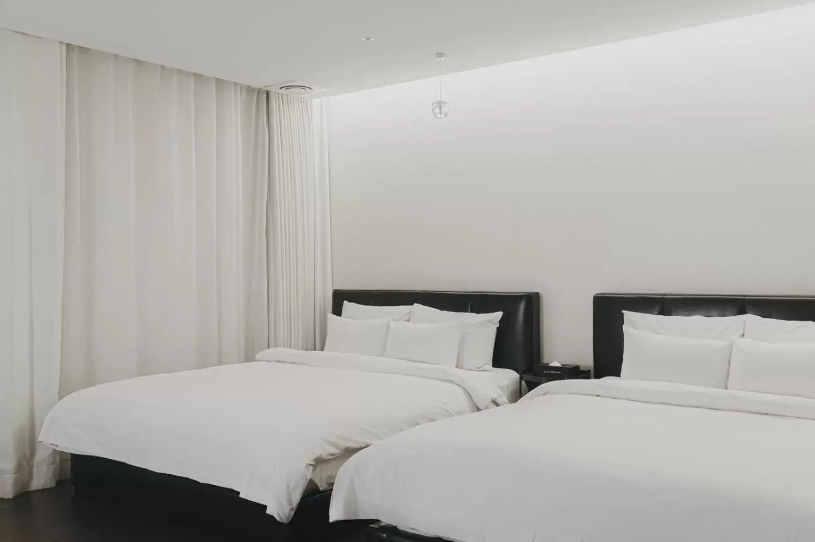 Bed in ACC Design Hotel