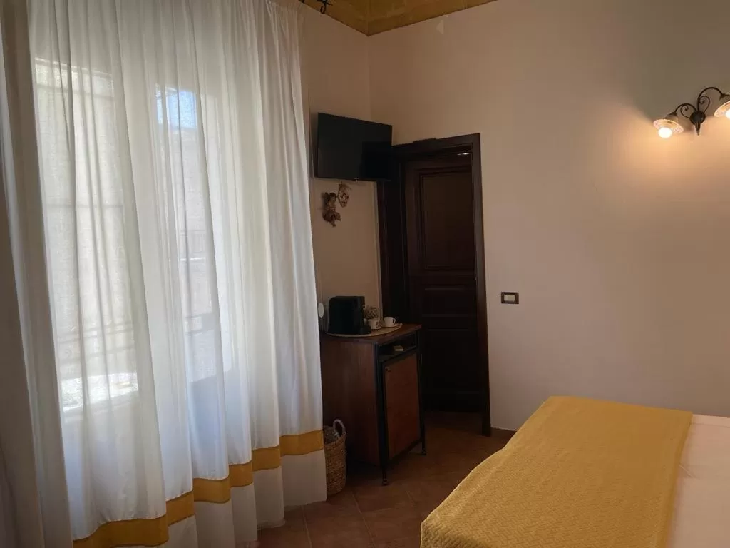 TV/Entertainment Center in Ai Dammusi Rooms