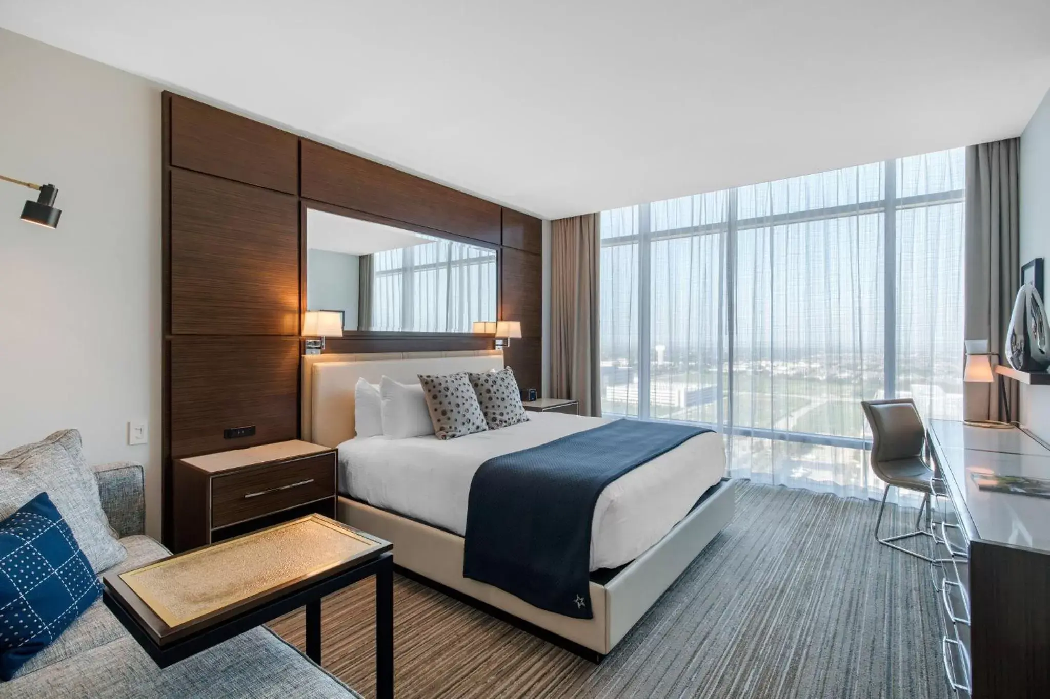 Photo of the whole room, Bed in Omni Frisco at The Star