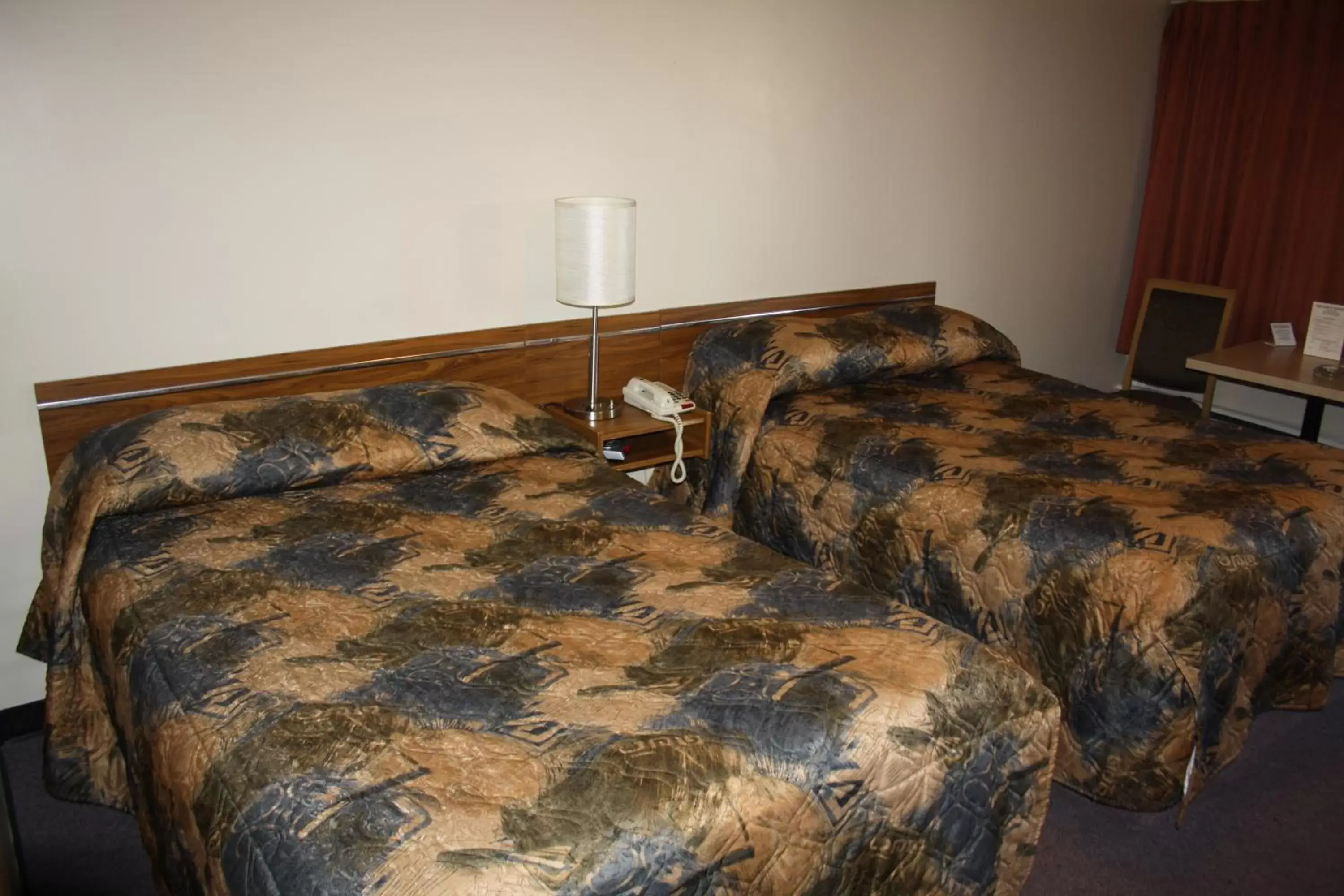 Bedroom, Bed in BCMInns - Peace River