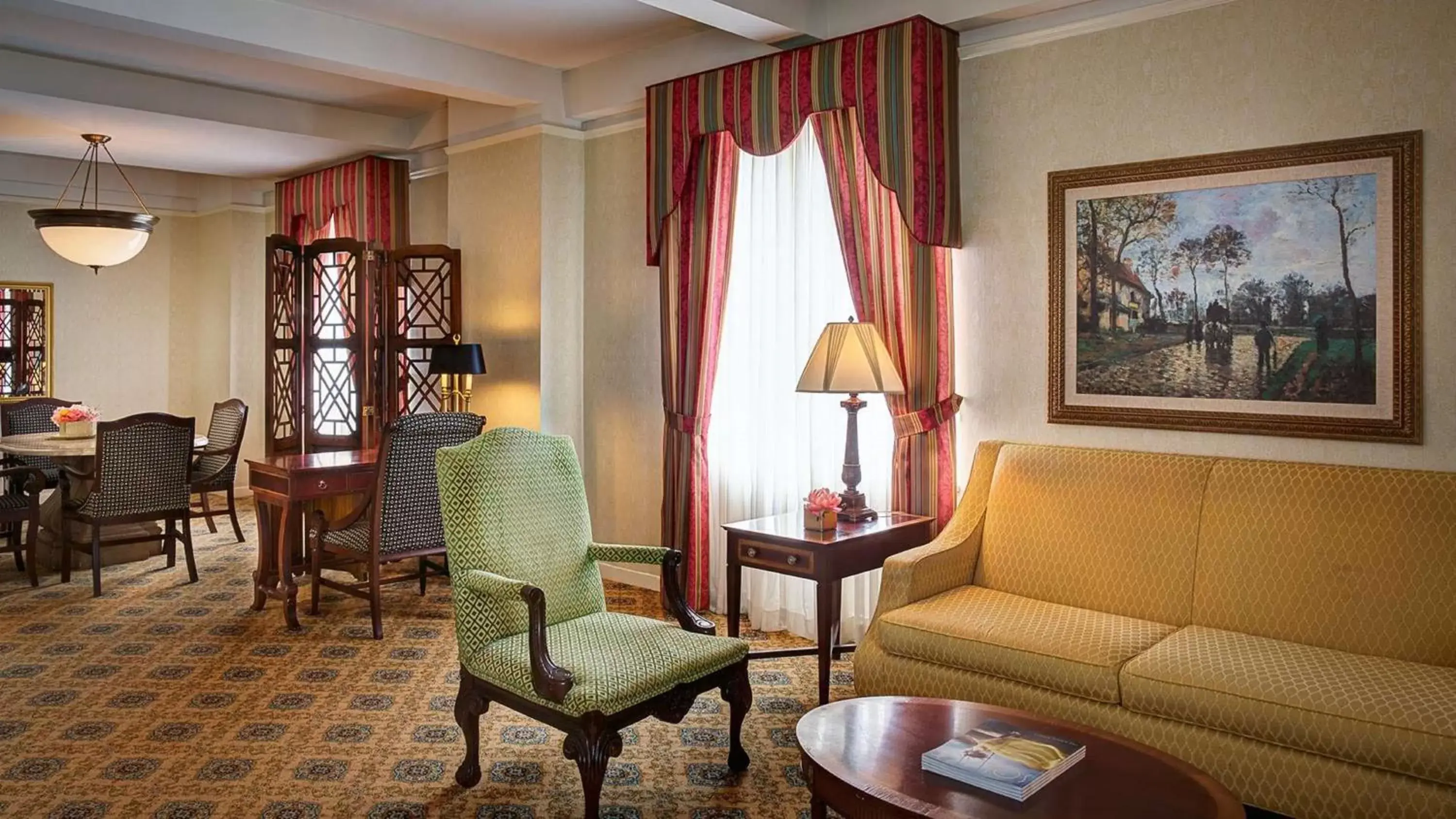 Living room, Seating Area in Amway Grand Plaza Hotel, Curio Collection by Hilton